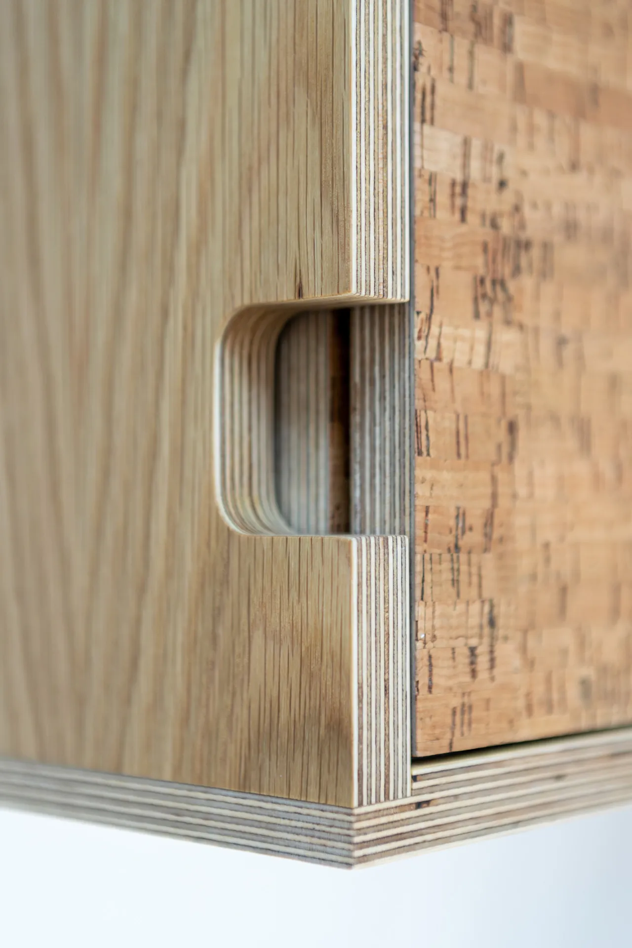 ‘Edge’ handle cut out in a sliding door wall unit.
