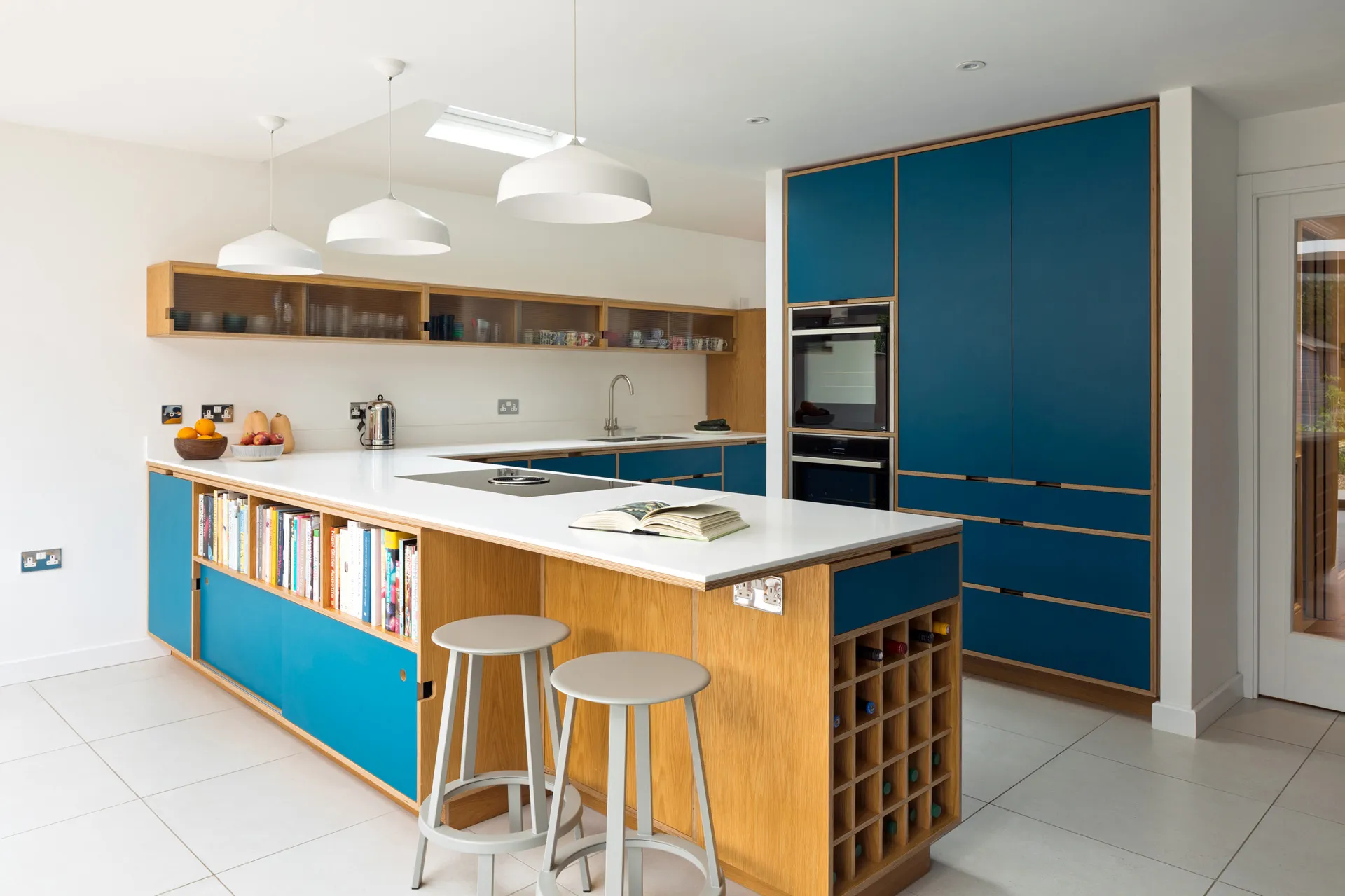 At Uncommon Projects, we see the island as a canvas for creativity and practicality. Instead of a blank, utilitarian structure, we aim to make the island visually engaging from every angle.