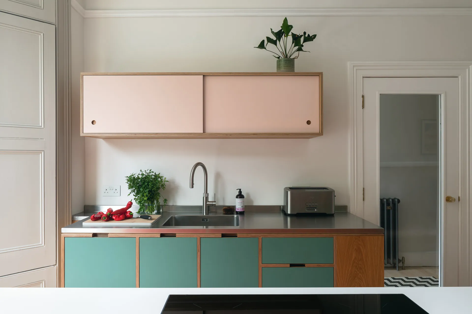 Try and provide even a small wall cupboard near the sink and dishwasher area. It’s so much quicker and easier to empty the dishwasher into a cupboard directly above.