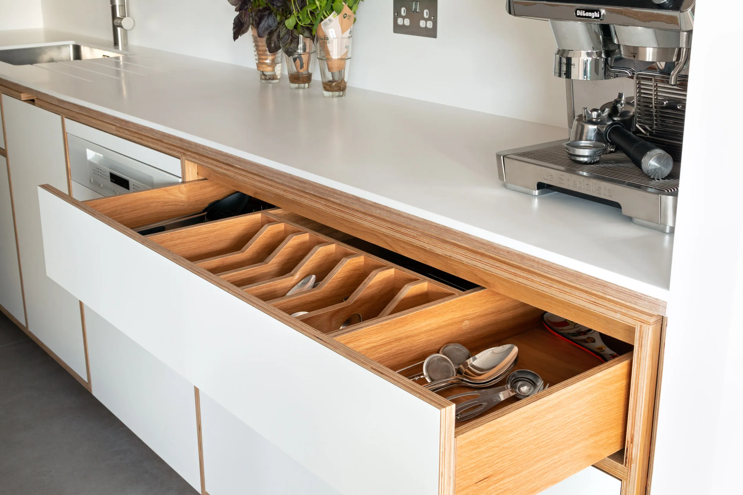 Plywood cutlery drawer and corian worktop