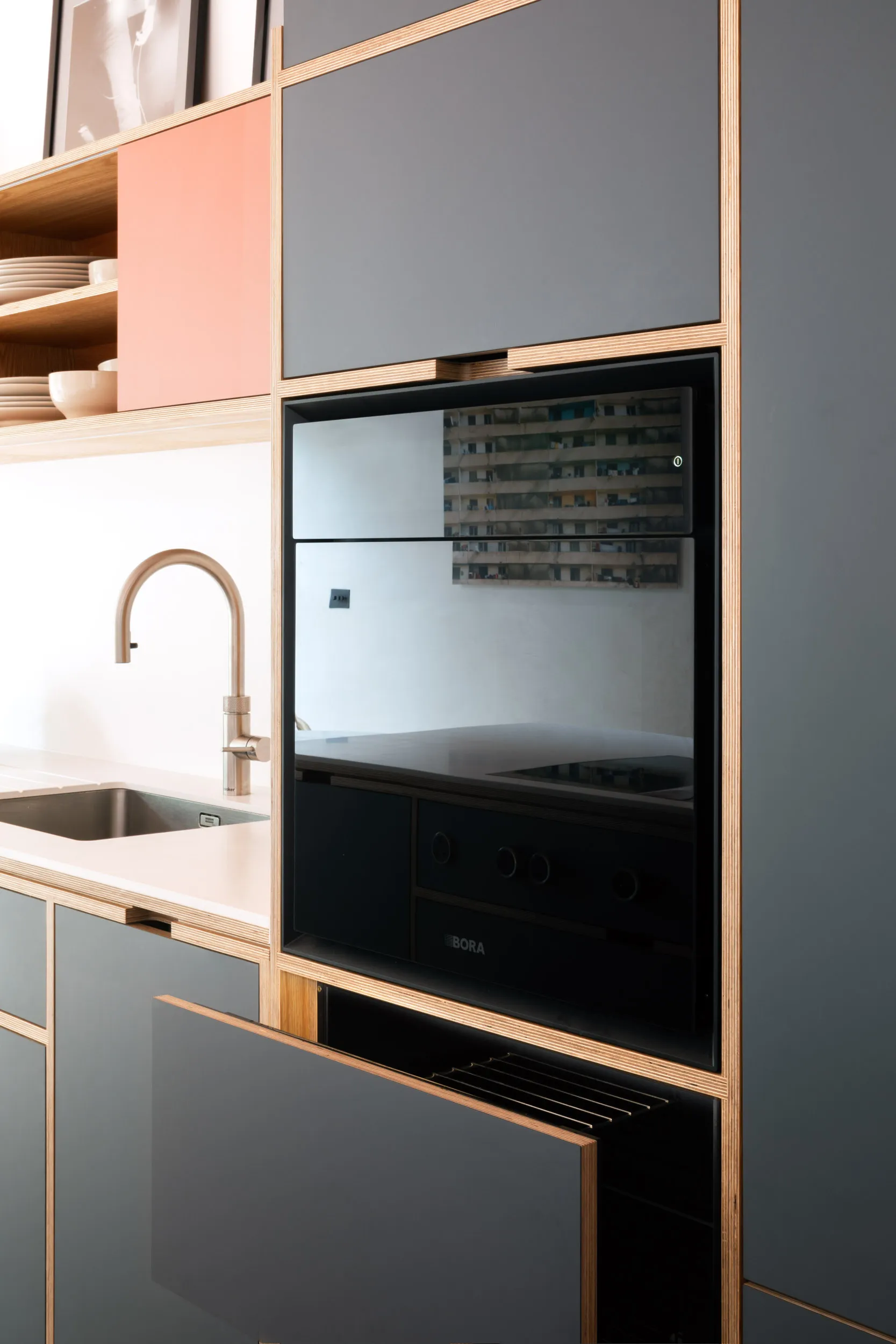 plywood kitchen with integrated double door fridge freezer