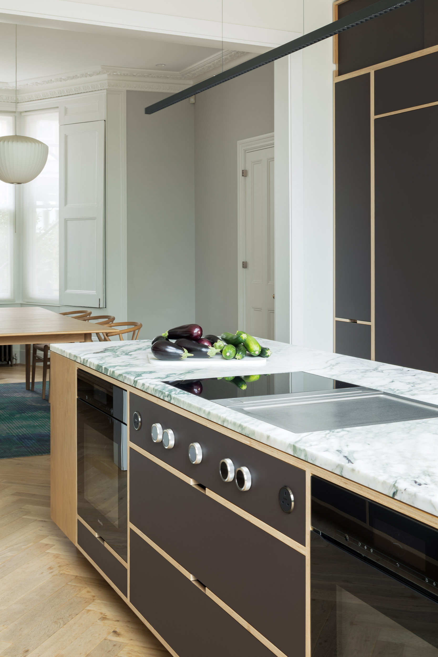 Plywood island with marble worktop