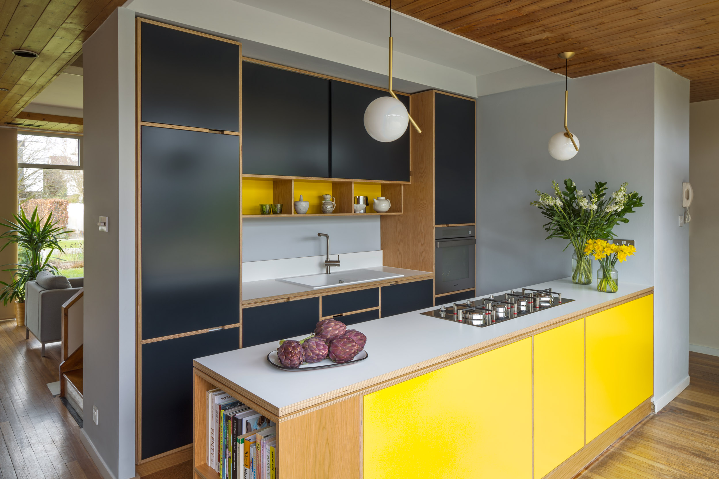 Bespoke plywood kitchen details. Corian worktop