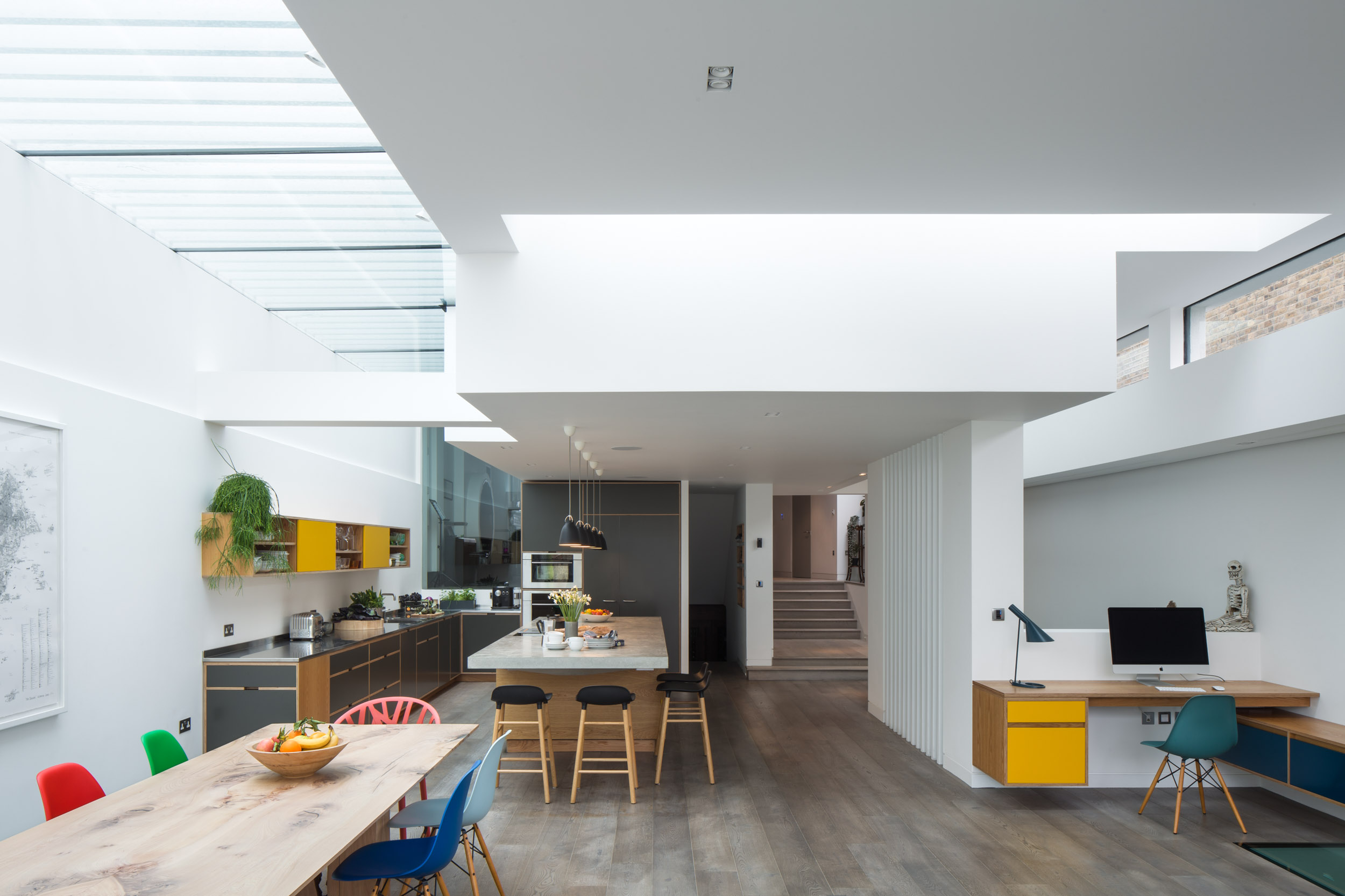 Huge open plan kitchen with plywood furniture