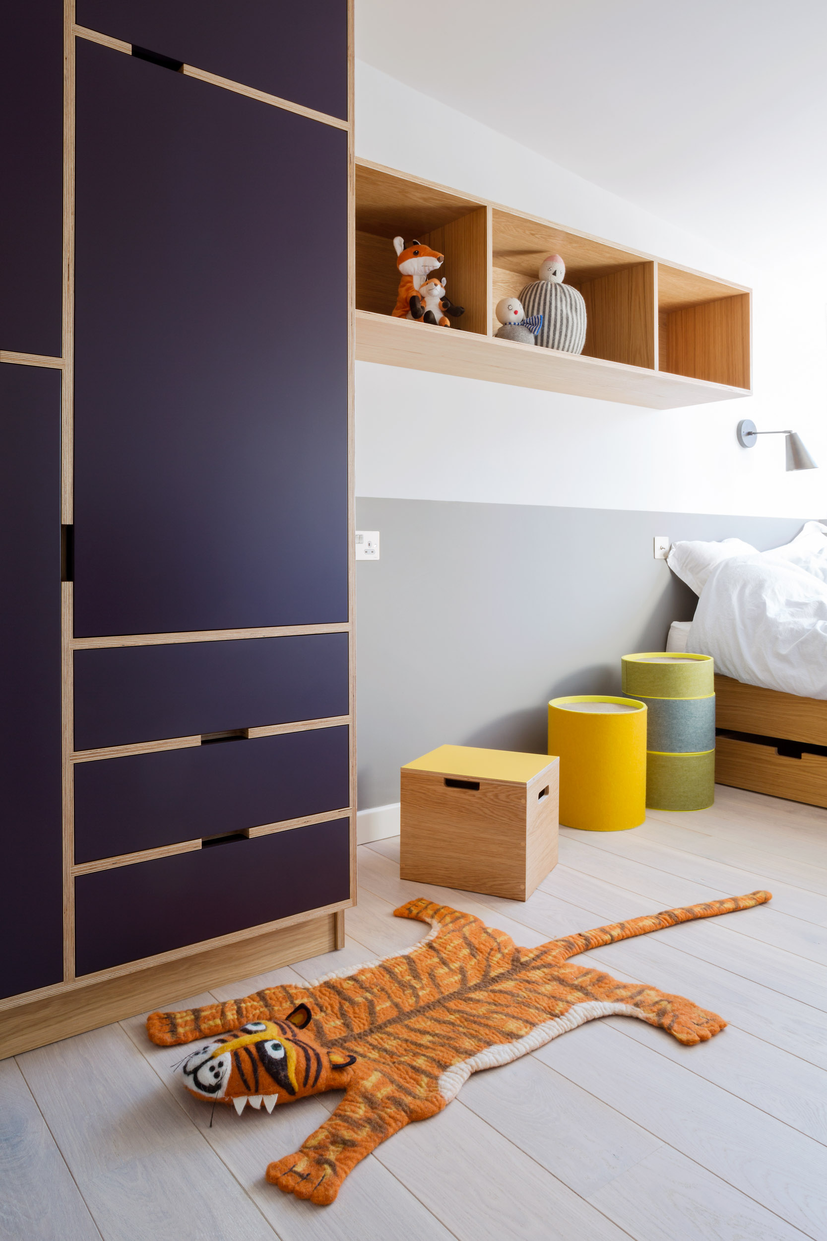 Plywood Wardrobe and Shelving with tiger rug