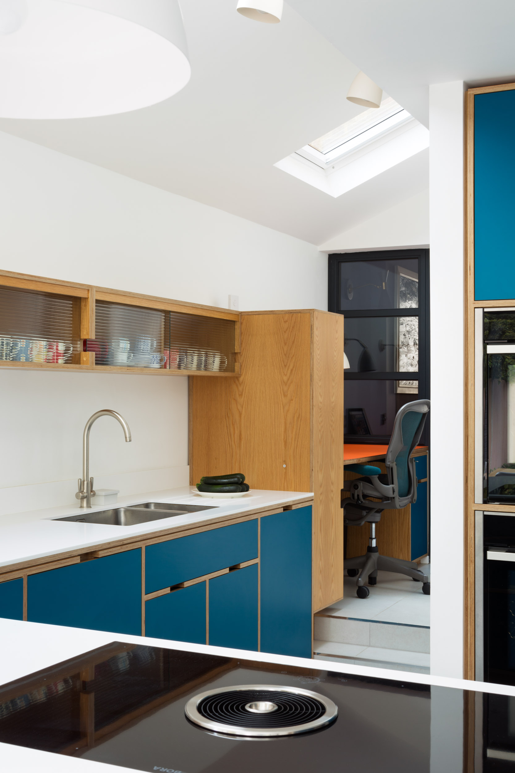 Bespoke plywood kitchen in teal and oak