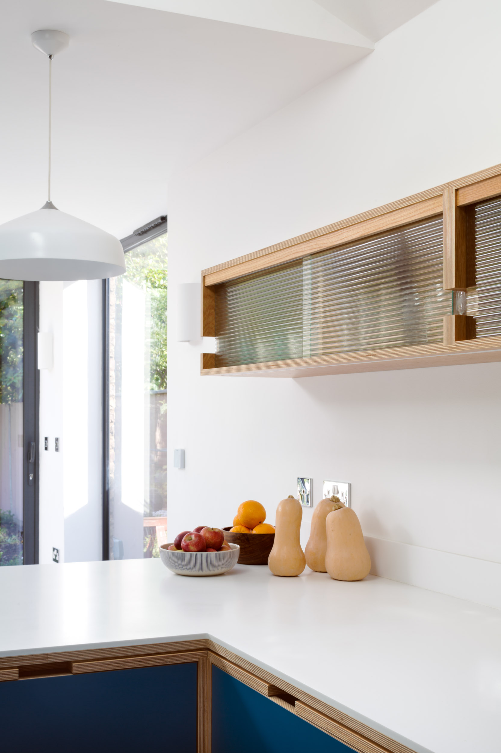 Reeded glass wall cabinet