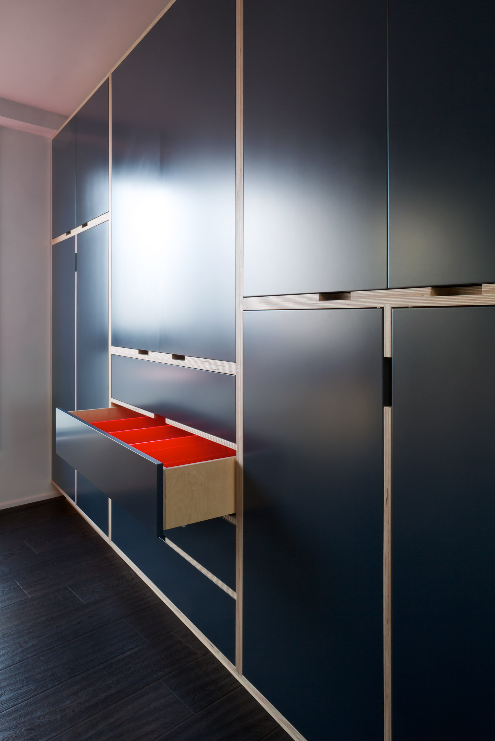 Dark Blue Floor-to-Ceiling Birch Ply Wardrobe with neon drawer dividers