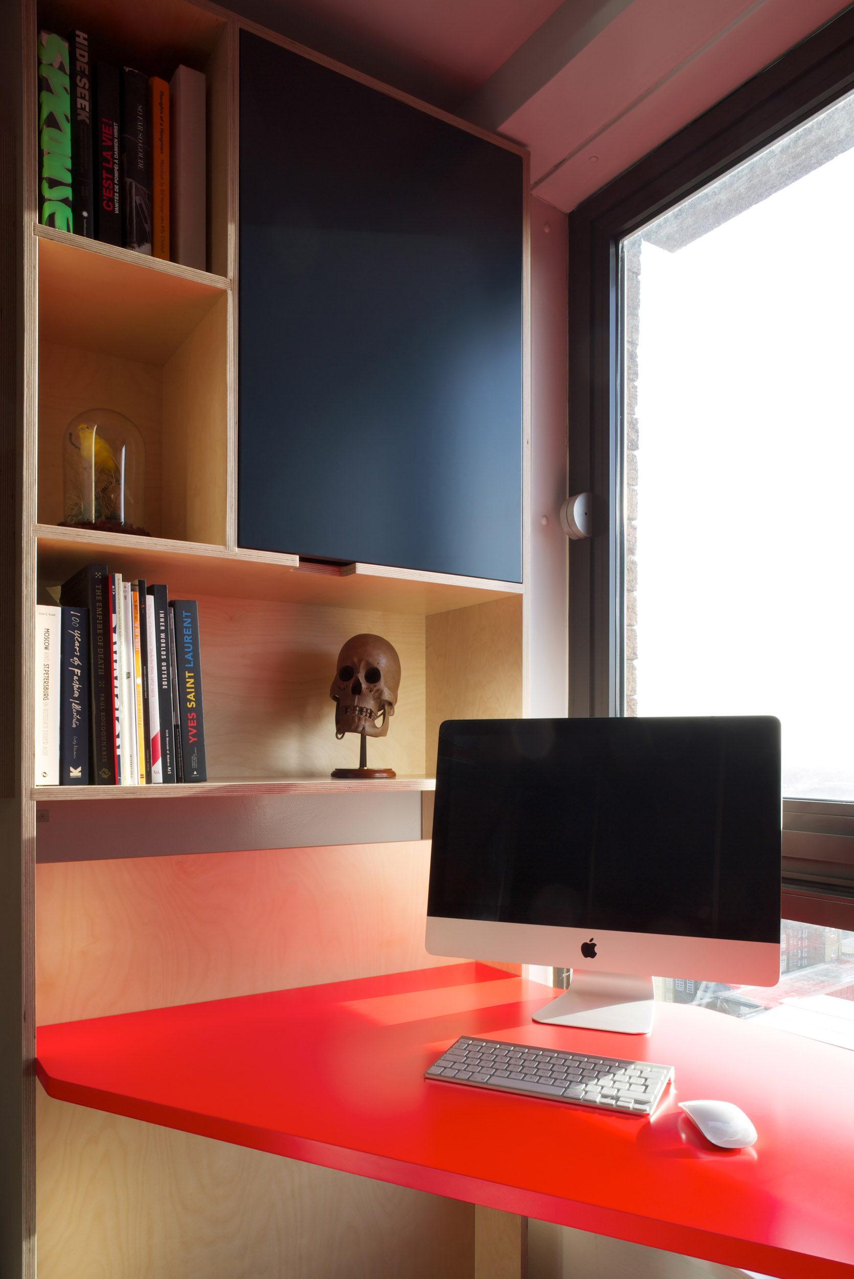 Bright Red Ply Desk With Mac Computer
