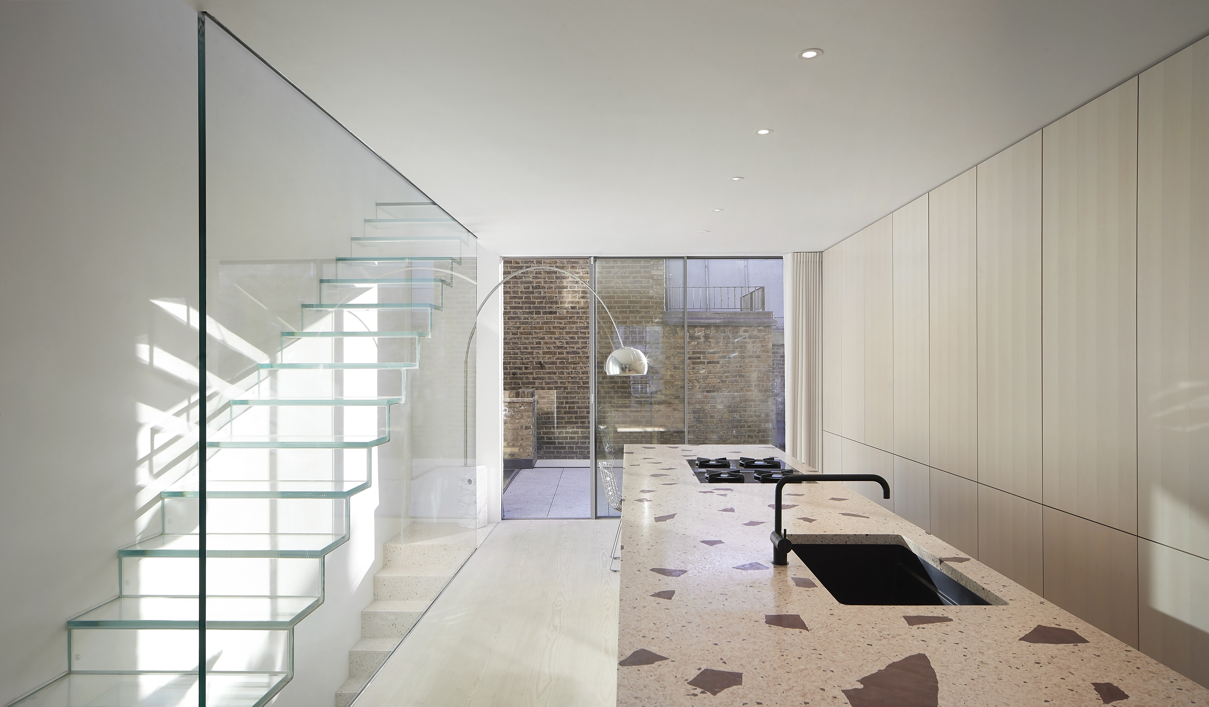 Bespoke plywood joinery unites this house by Alan Power Architects