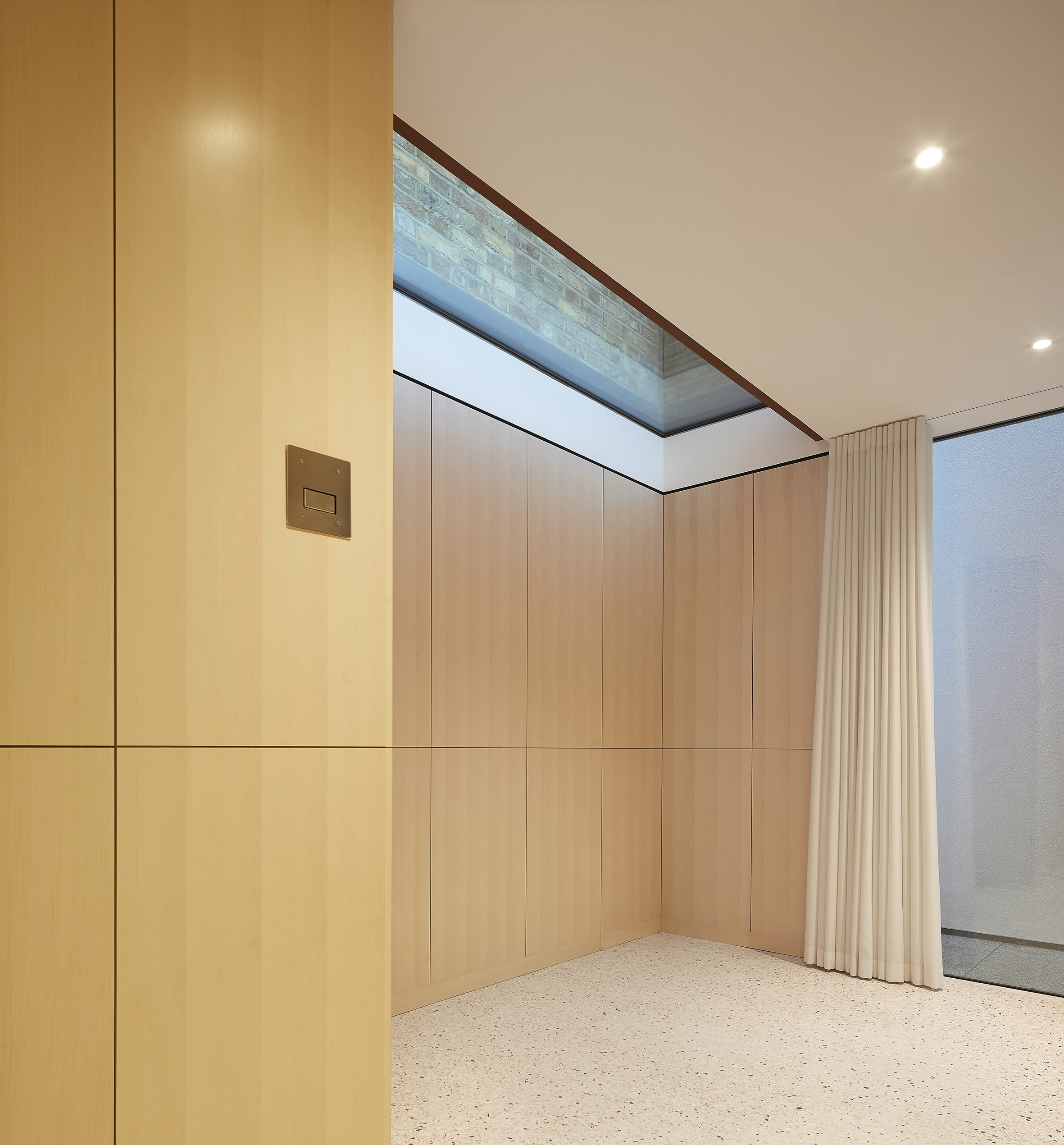 Minimalist modern ash plywood panelling / cladding