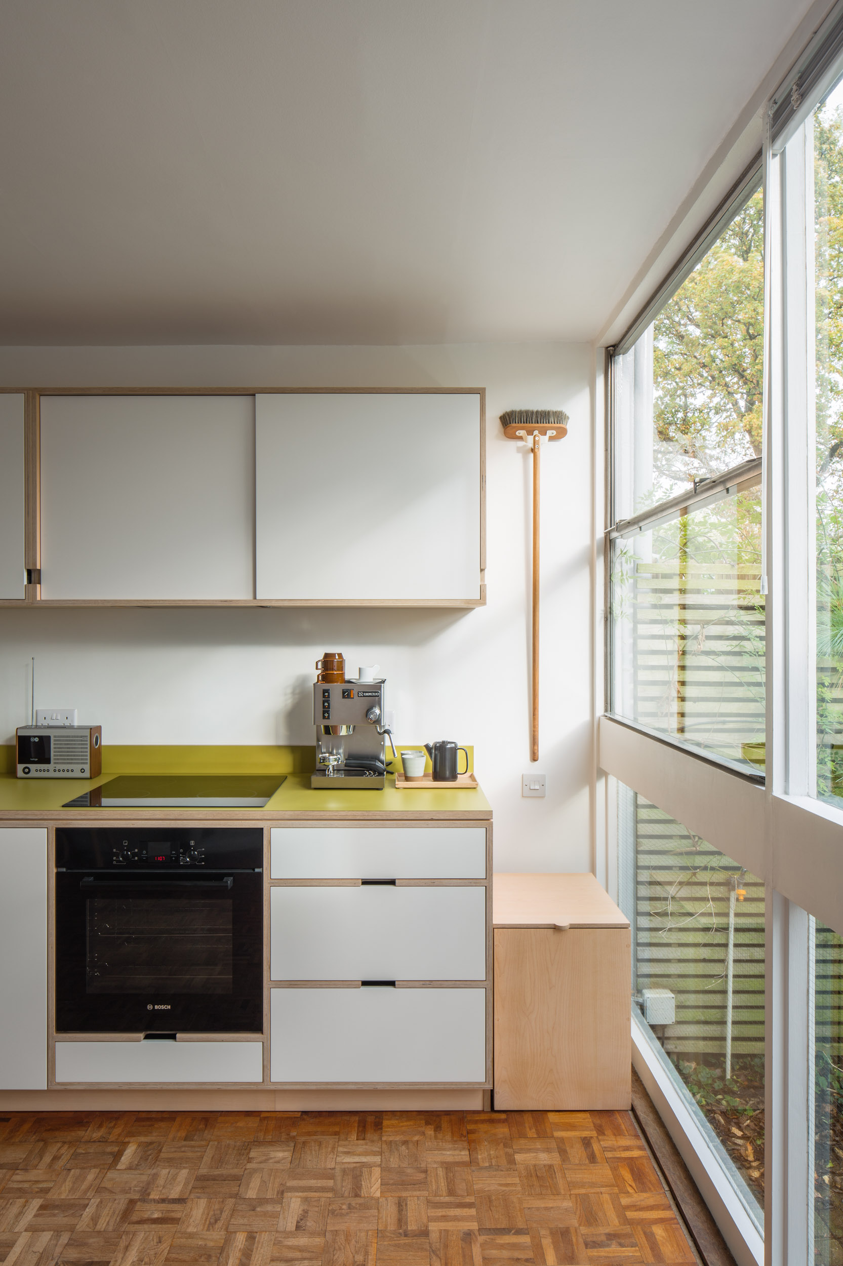 Maple ply and green laminate worktop. Midcentry kitchen