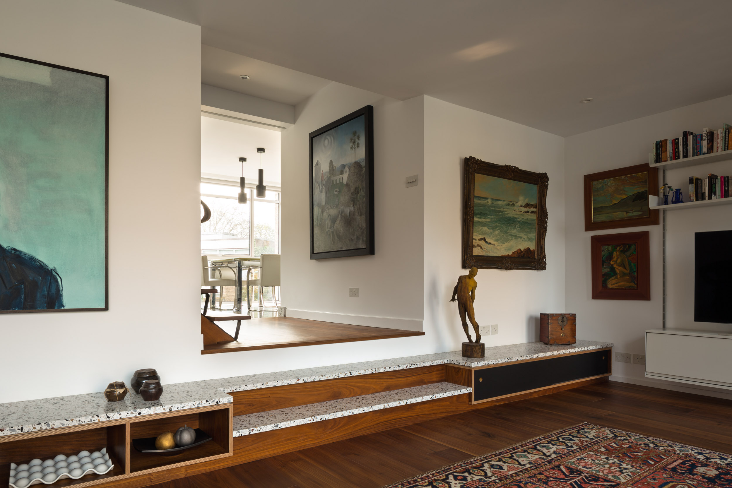 Walnut and terrazzo steps with integrated storage