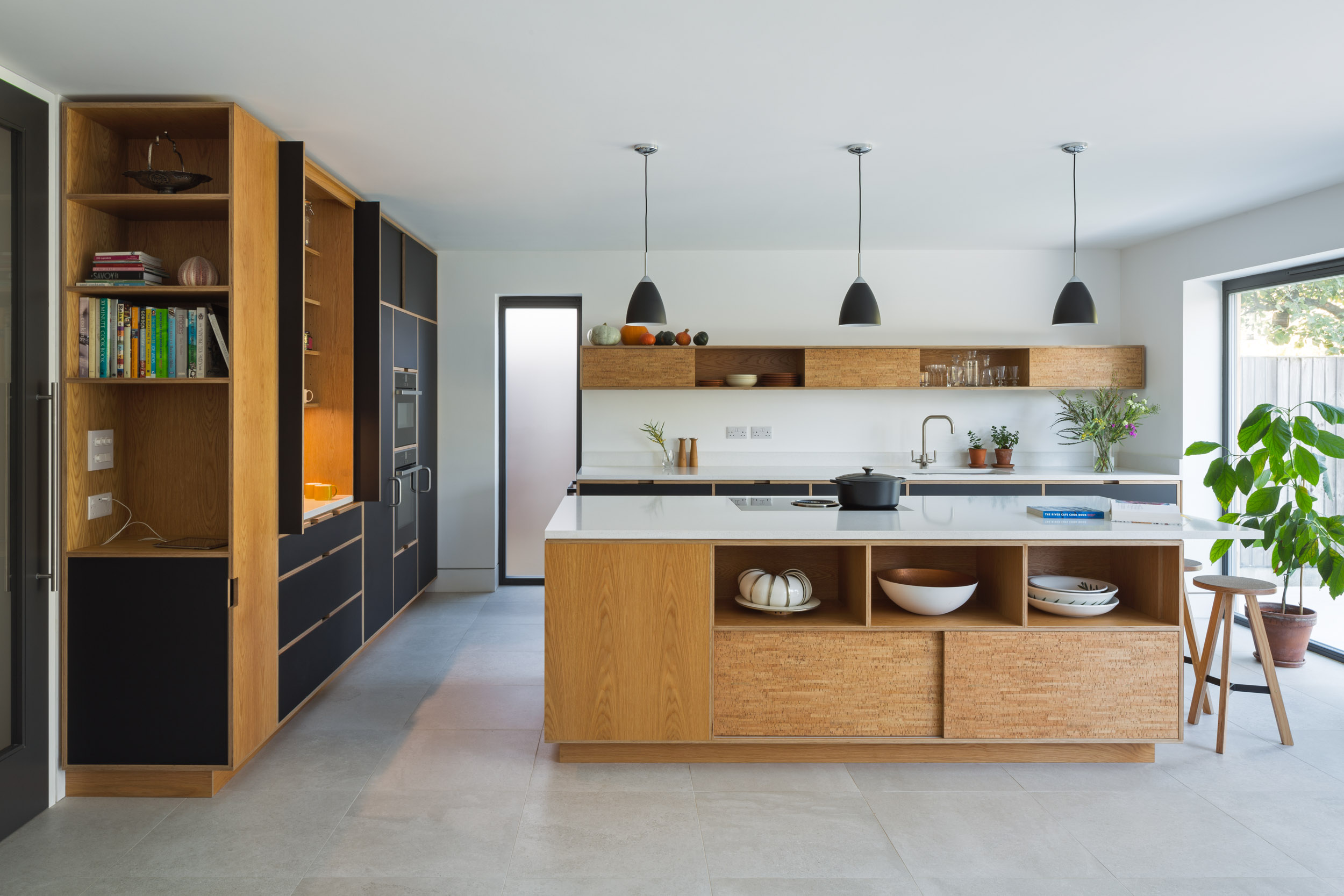 Black and cork plywood kitchen