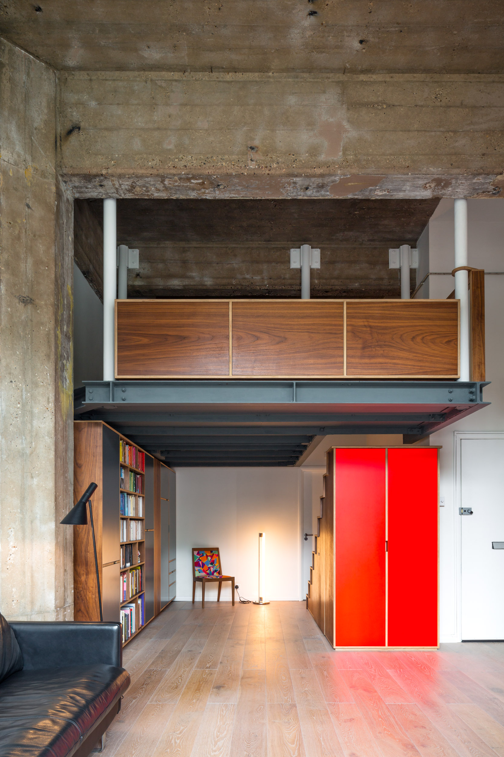 walnut living room storage with neon red wardrobes