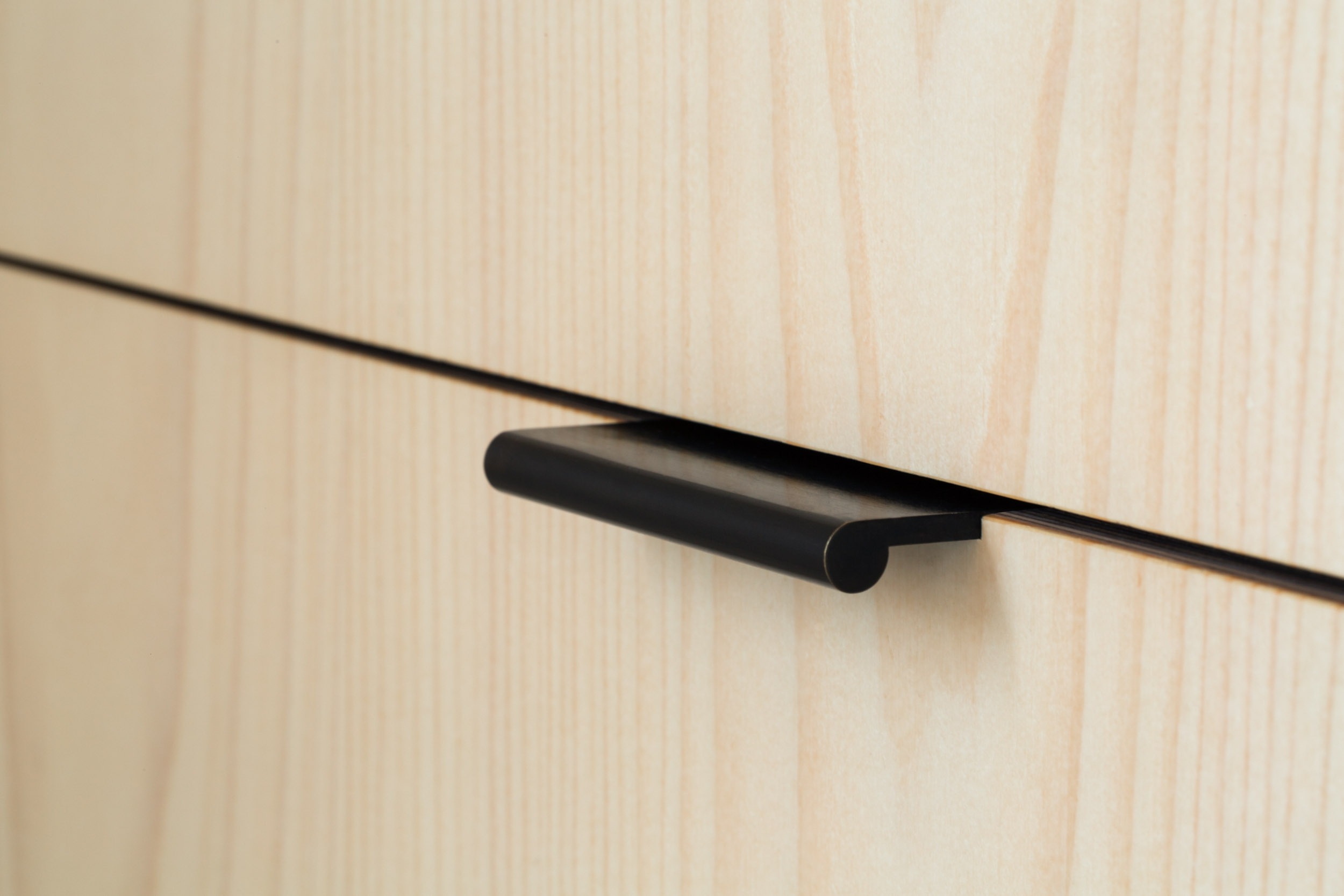 Pull handle on plywood door detail