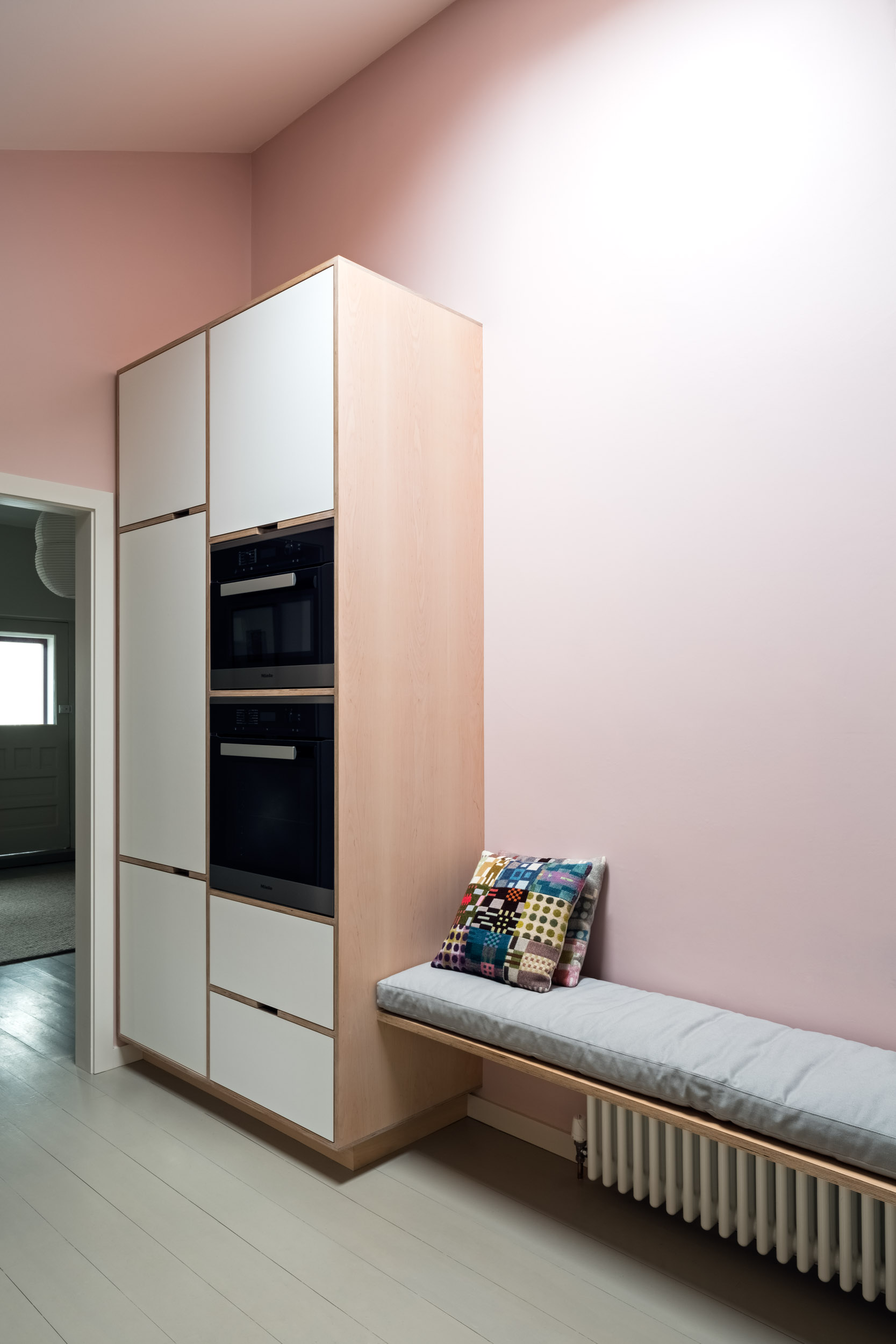 Maple full height cabinet with bench seating