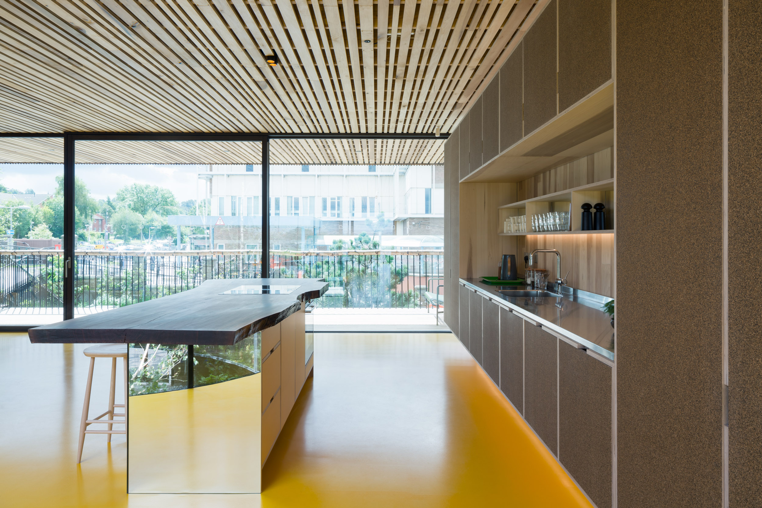 Ply Kitchen cork veneer office kitchen with mirrored island