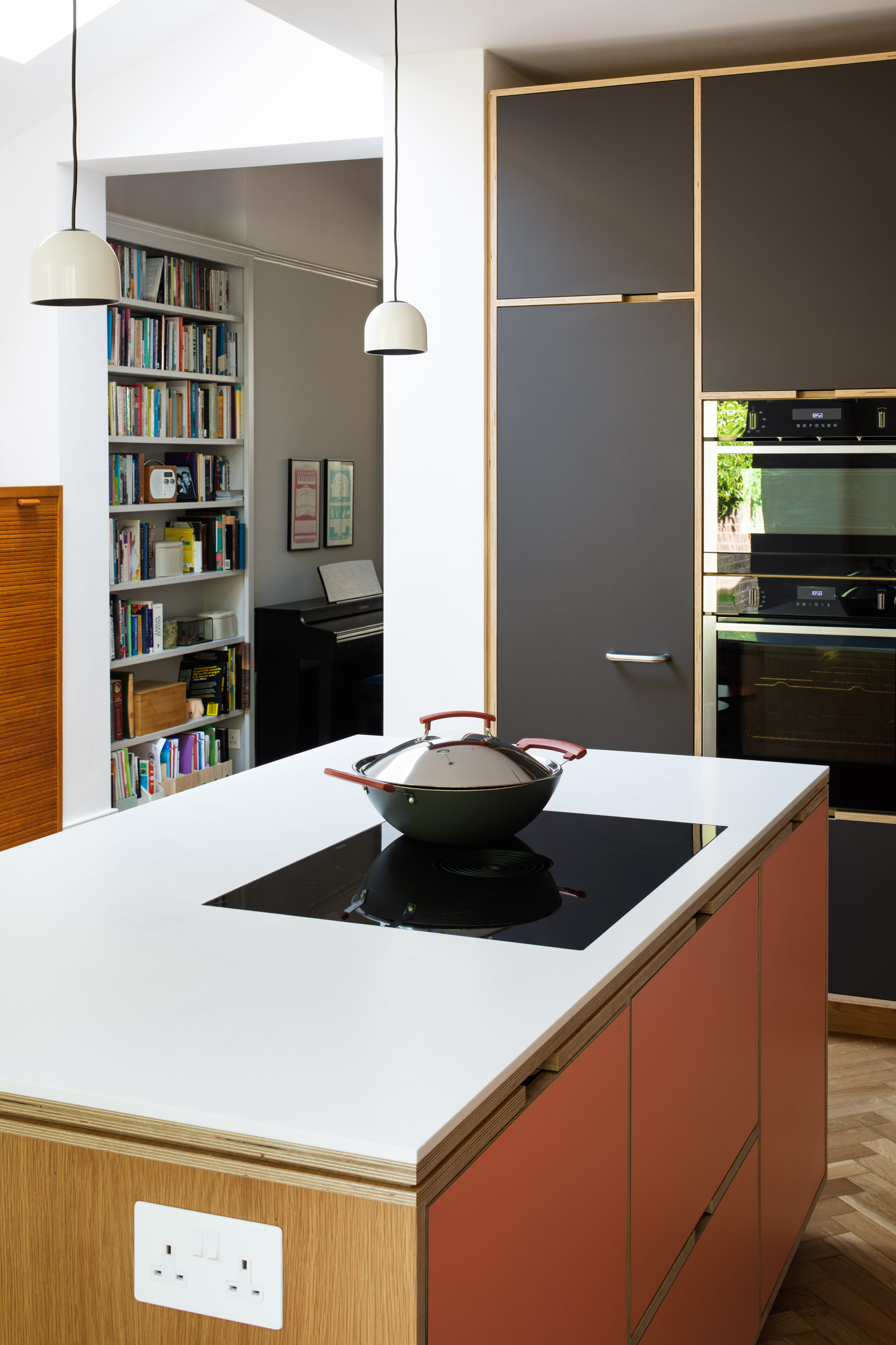 plywood kitchen with wok on island