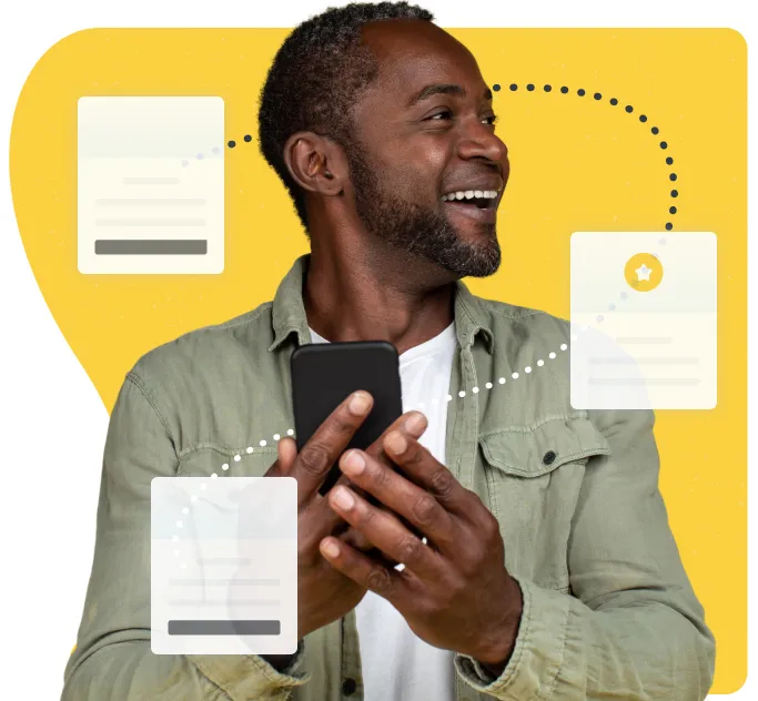 man holding phone with plan cards swirling around him