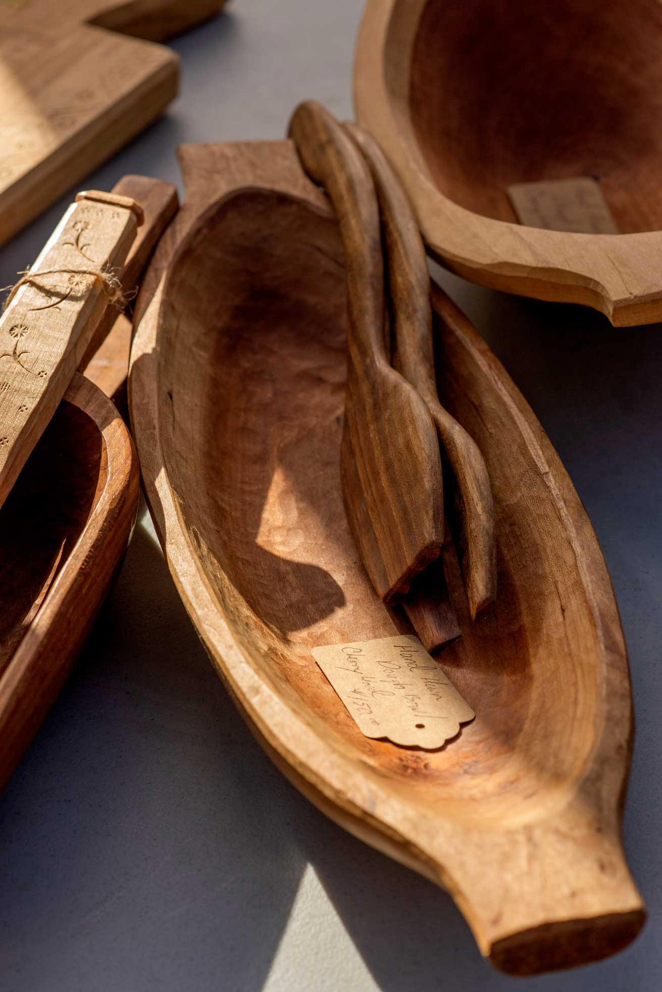 Hand-carved wooden spoons and bowl.