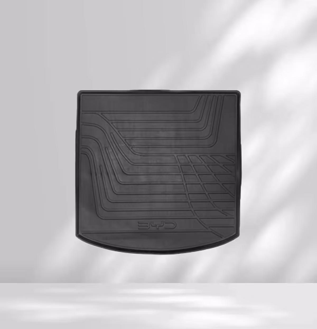 Schwarze Gummimatte auf weißem Hintergrund