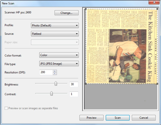Stick the page you want to scan into your scanner and click Preview.