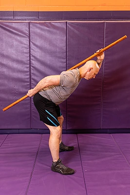 man demonstrating neurtral spine drill