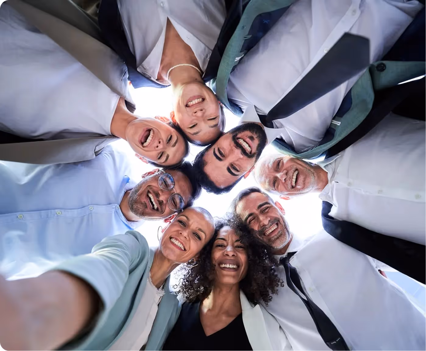 A group of people standing in a circle.