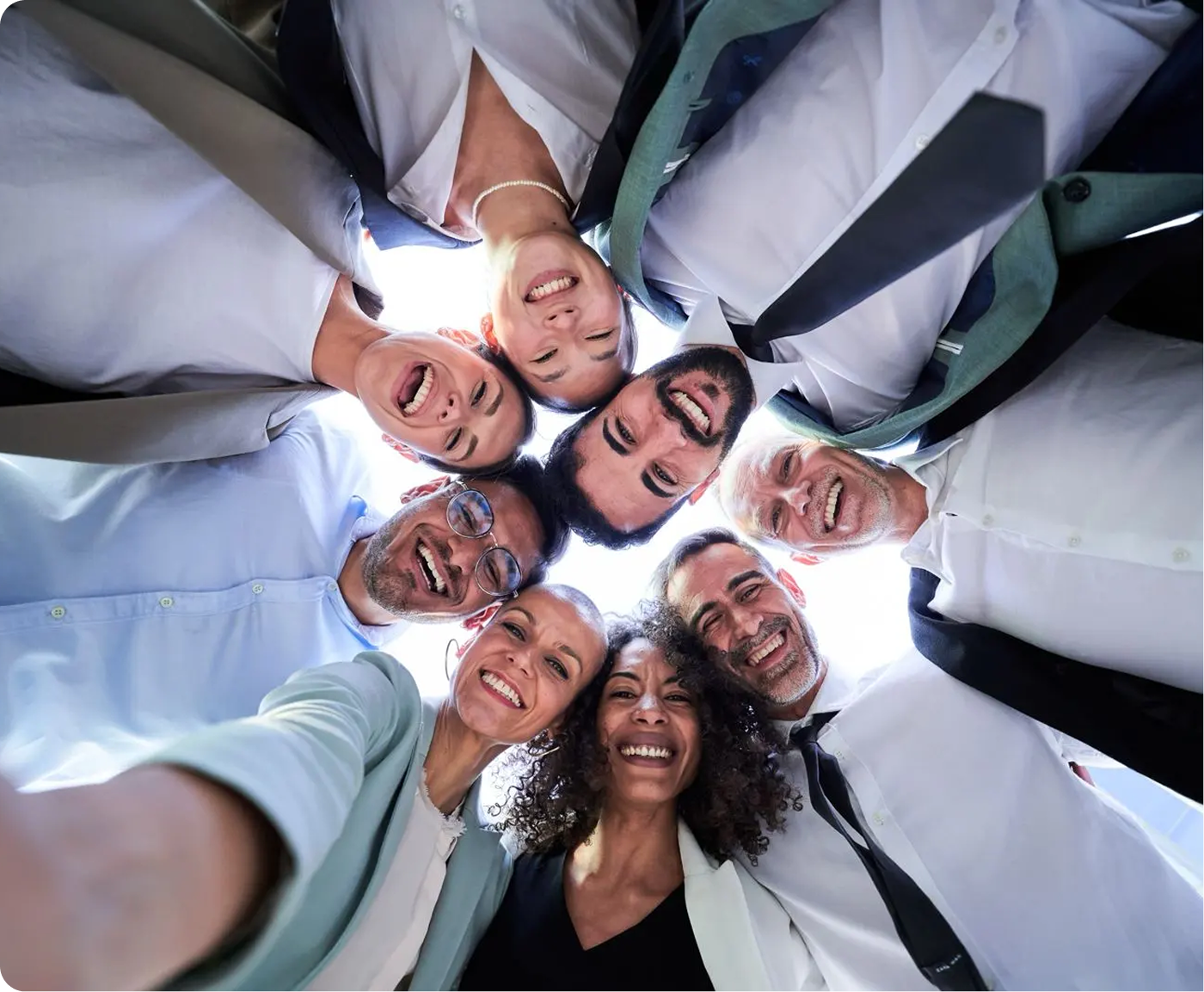 A group of people standing in a circle.