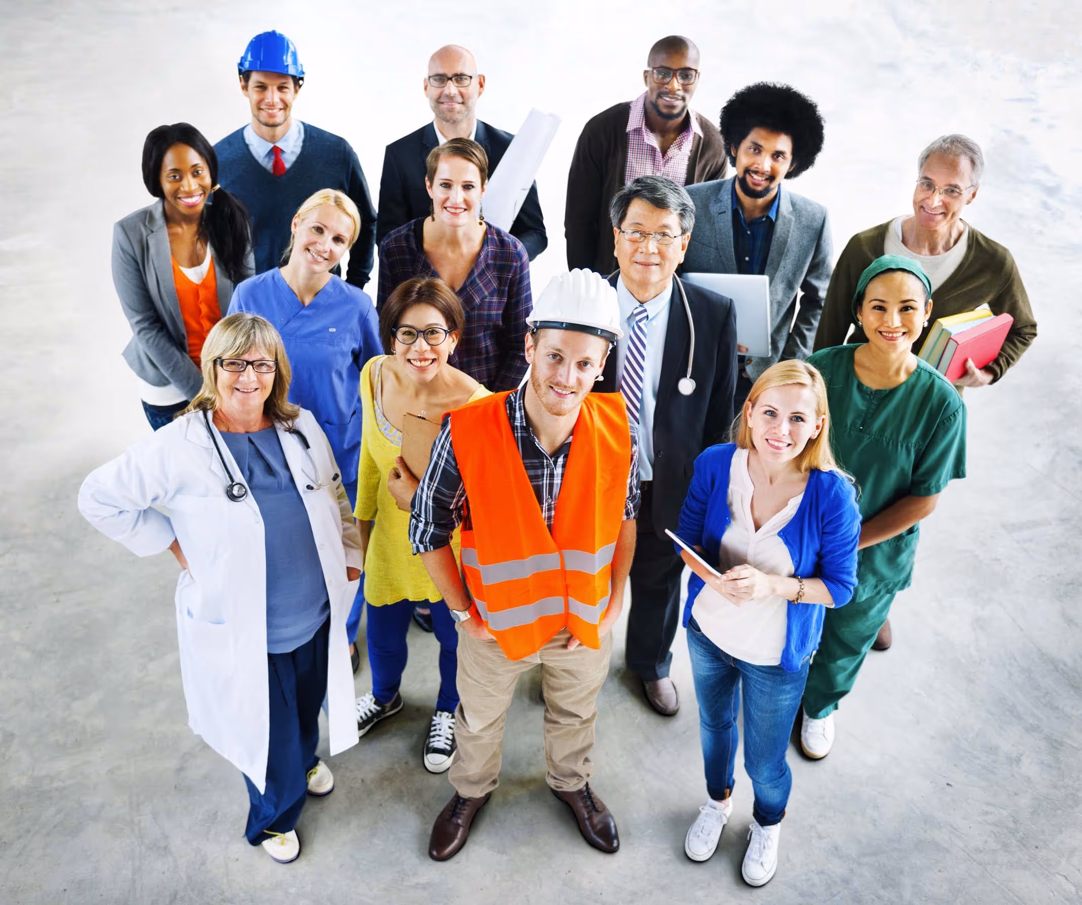 A group of professionals standing together, representing retail, corporate, service, and trade industries.