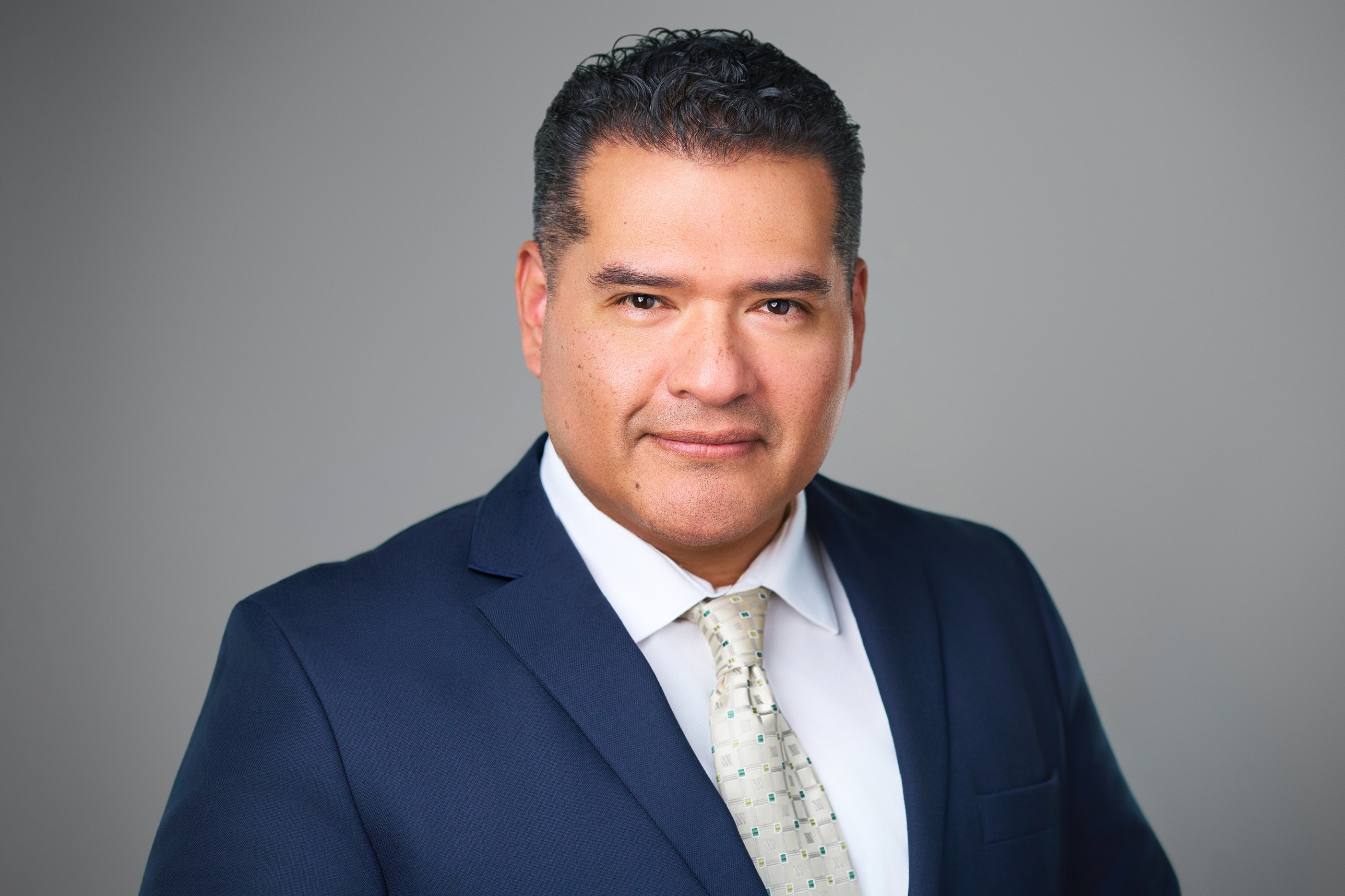 Headshot of Christian Buenano, Information Technology and Cybersecurity Professional at Coastal Debt Resolve.