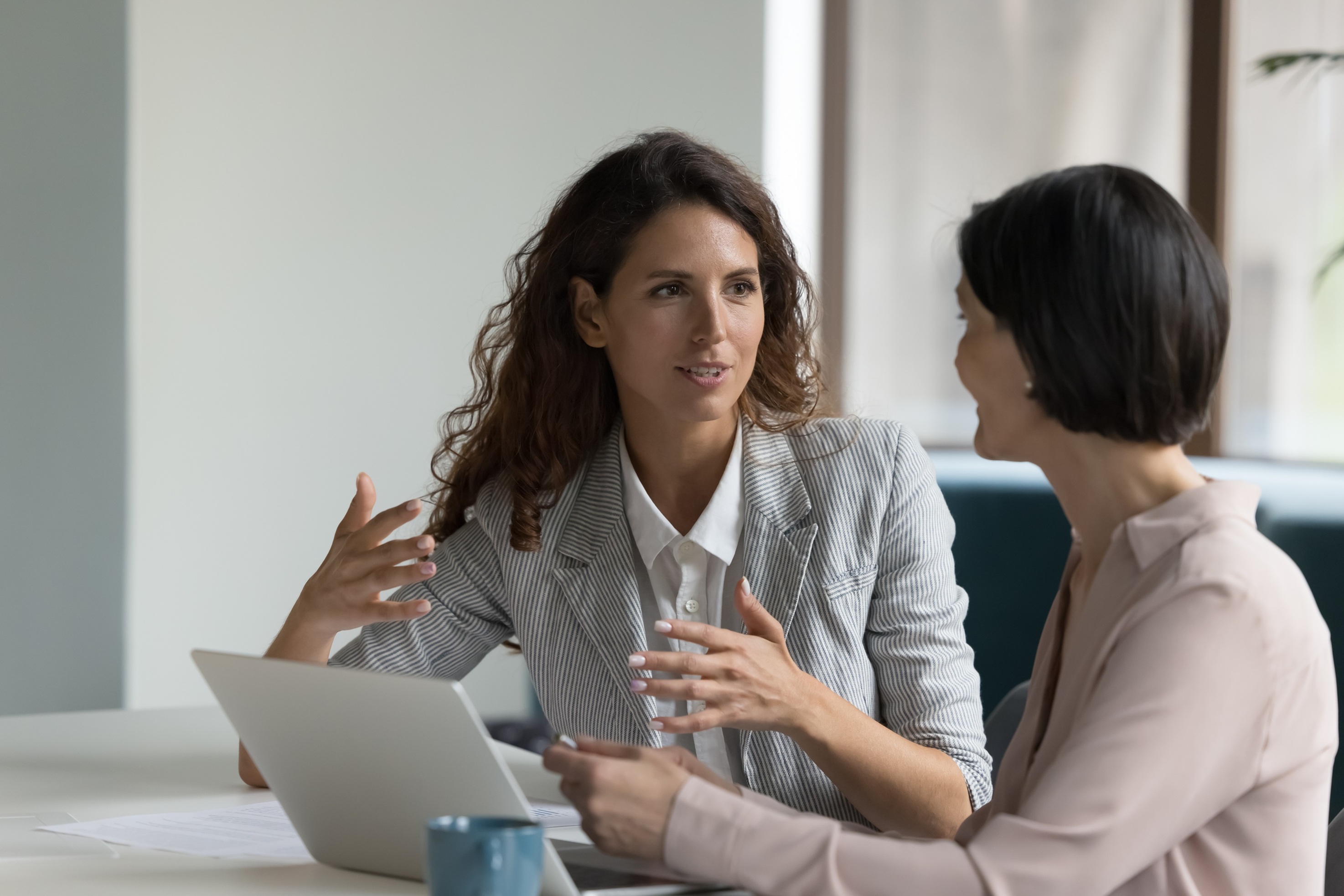 Coastal Debt Resolve specialist meeting with a small business owner to discuss MCA debt relief options and a personalized financial recovery strategy.