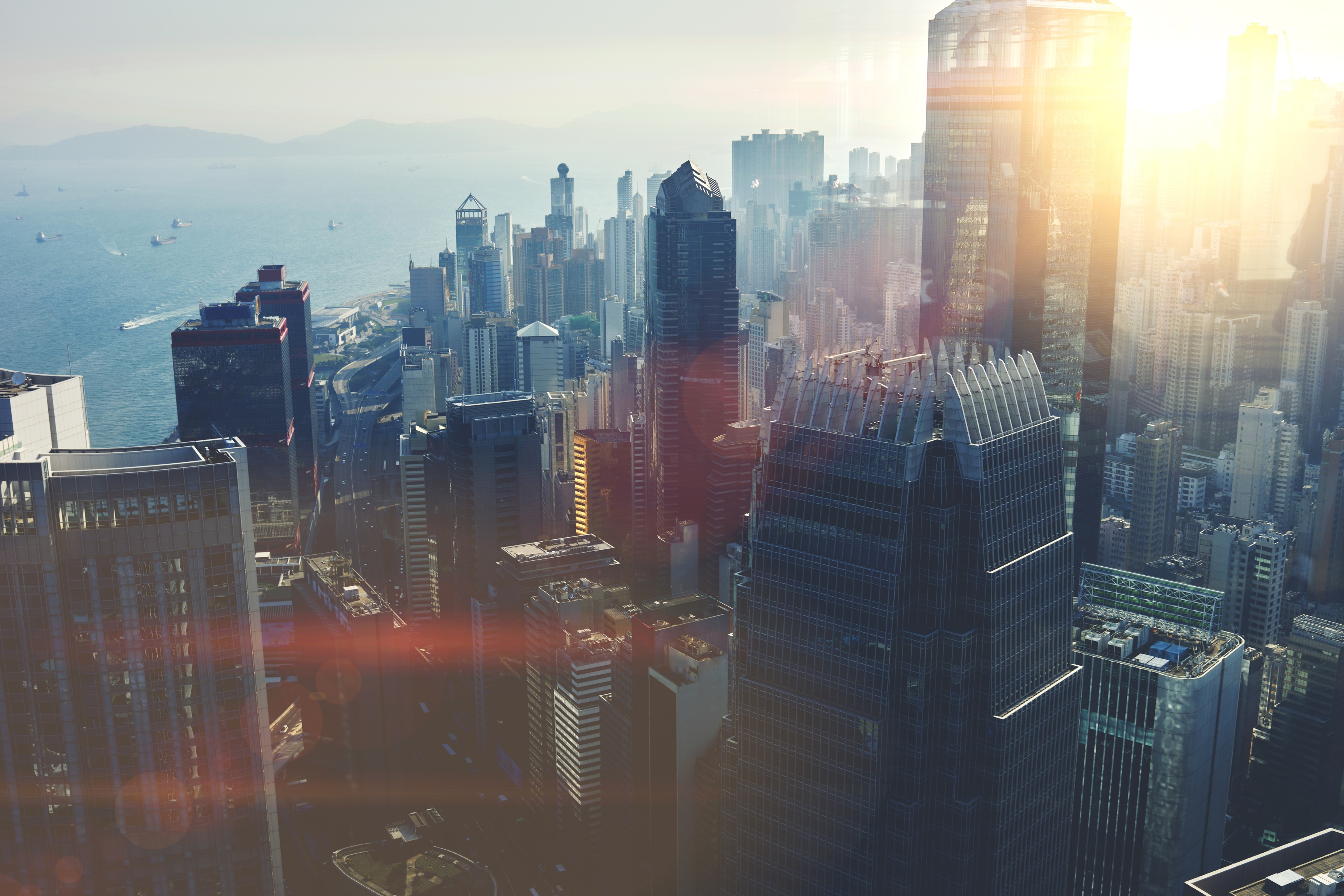 City skyline illustrating the business economy in Coastal Debt Resolve’s guide to veteran-owned business debt.