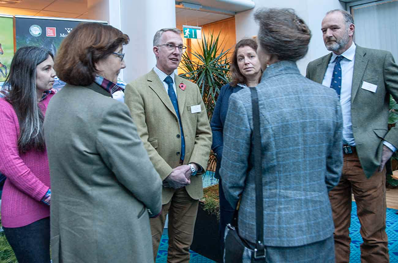 Lorna-Smith-and-Edward-Smith-with-Beth-Wells-meeting-HRH-The-Princess-Royal-