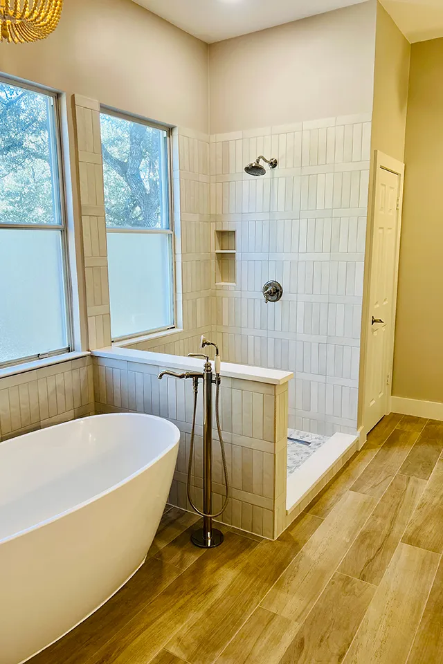 beautiful new professionally installed tile shower surround during bathroom remodel by Texas Twins Contractors near me in Austin