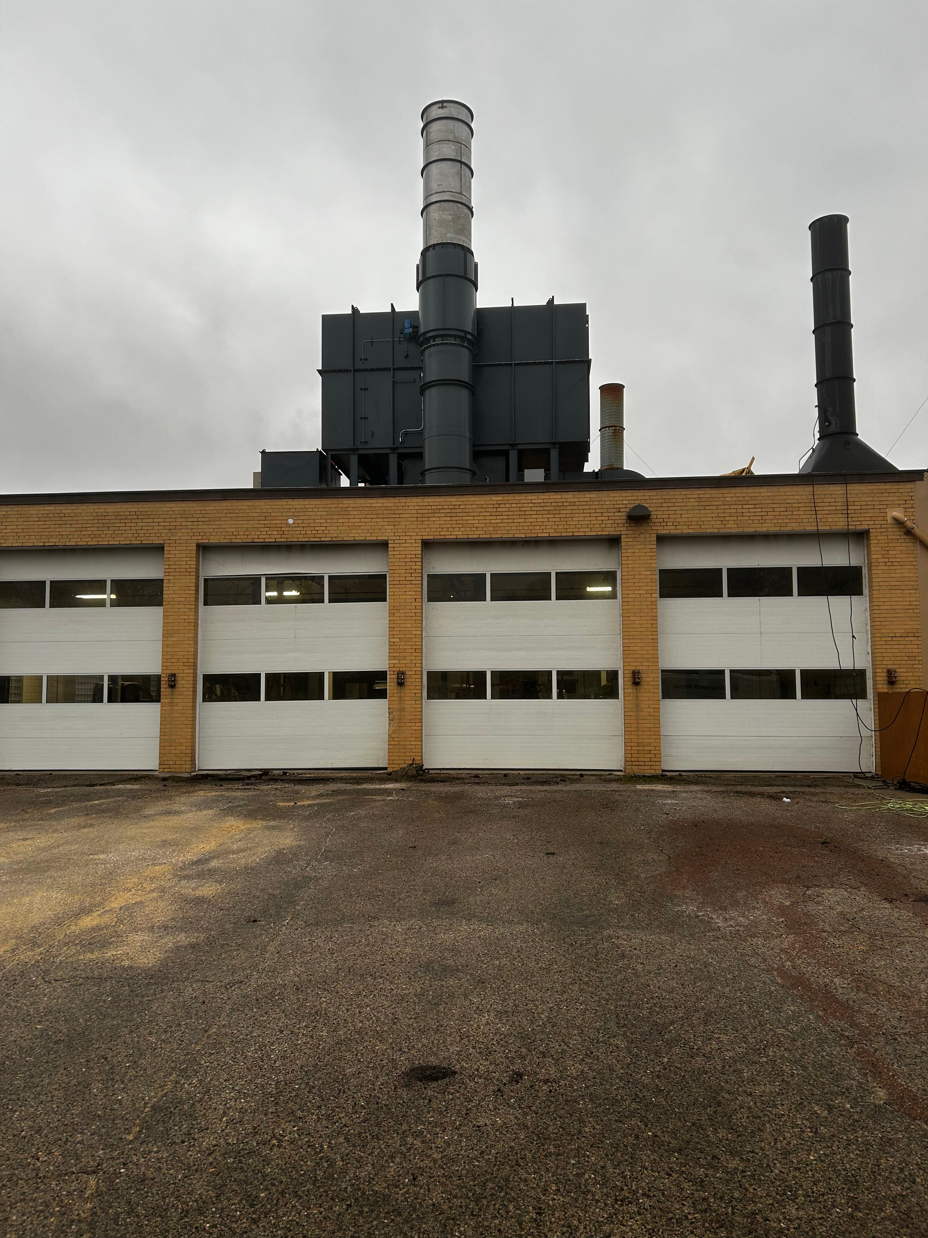 refurbished regenerative thermal oxidizer installed on roof of pharmaceutical industrial coating company