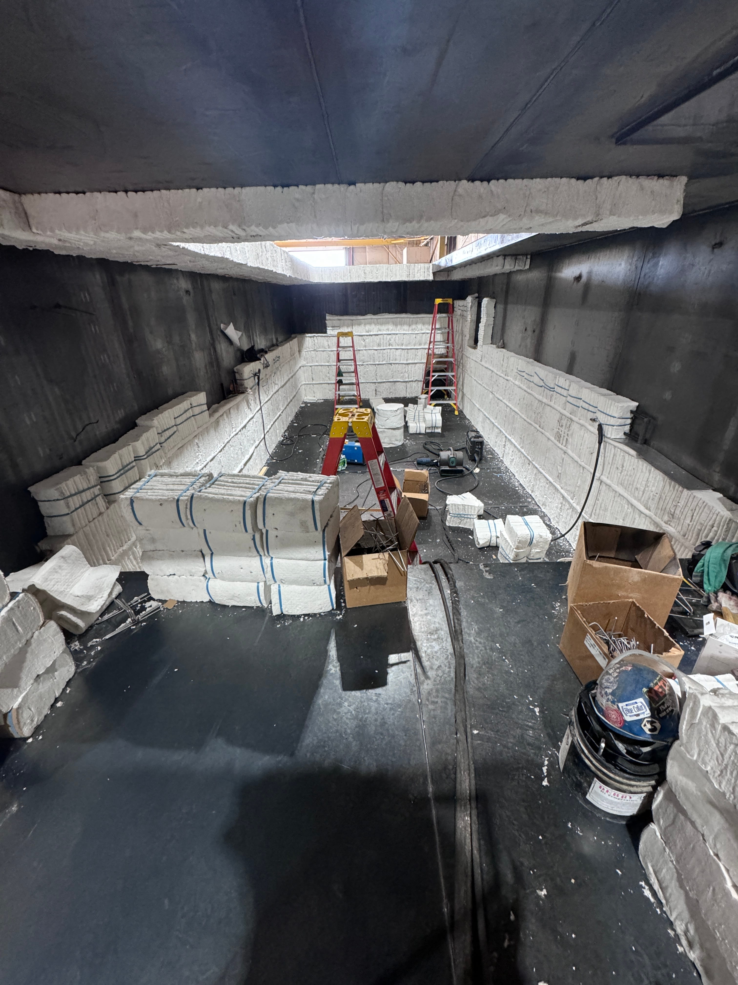 Insulation being installed in RTO chamber