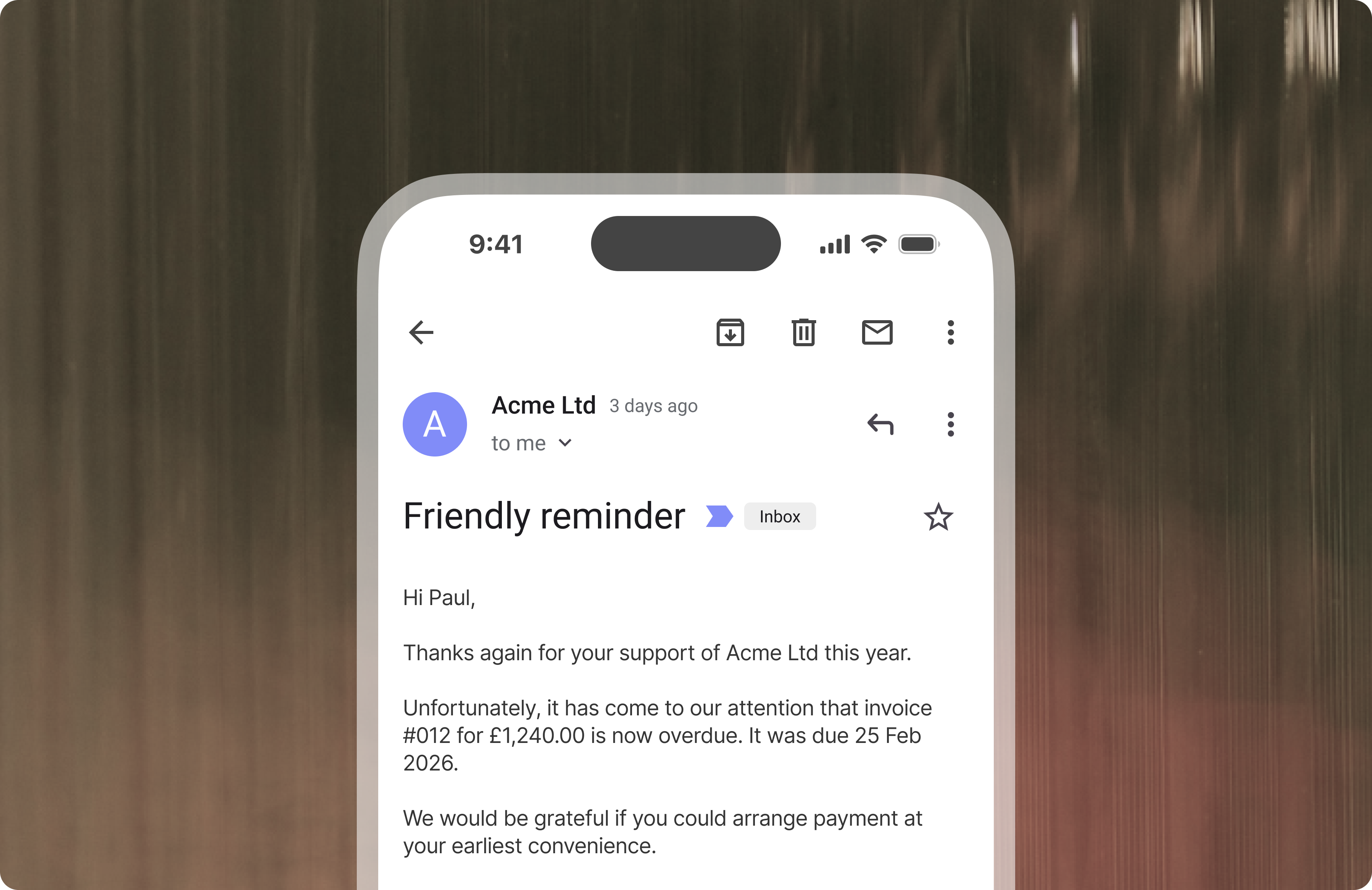 Phone screen showing a friendly payment reminder email.