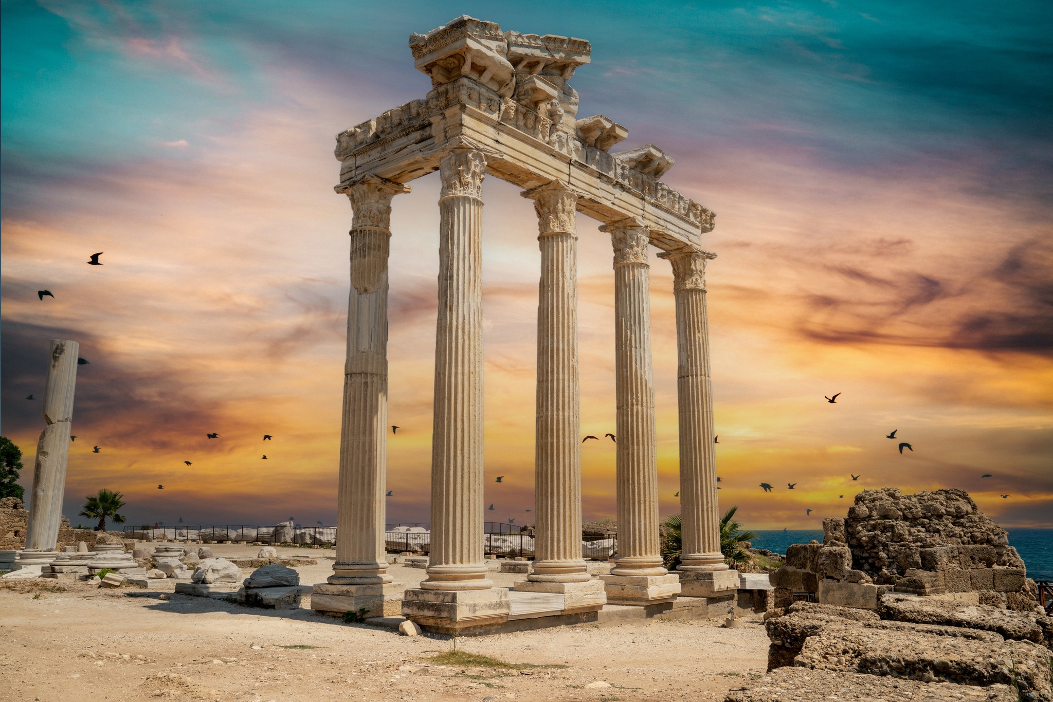 The columns of Old Side and the Apollo Temple at sunset.