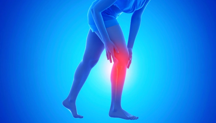 Person with a upper calf cramp, highlighted in red.