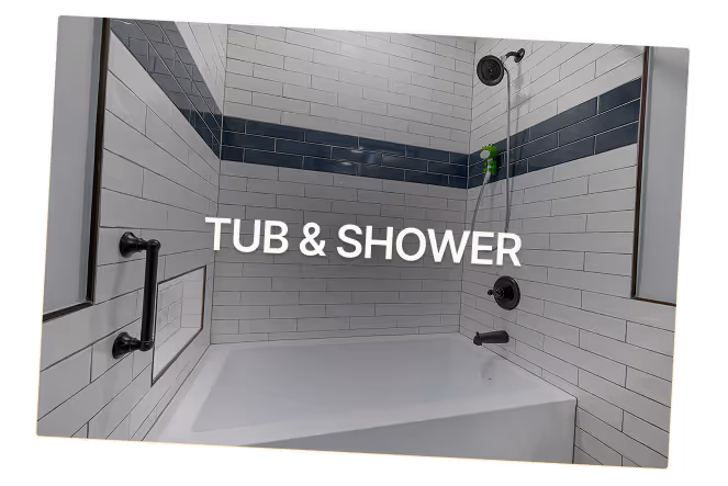 Tub‑and‑shower upgrade — white subway tile with blue accent band