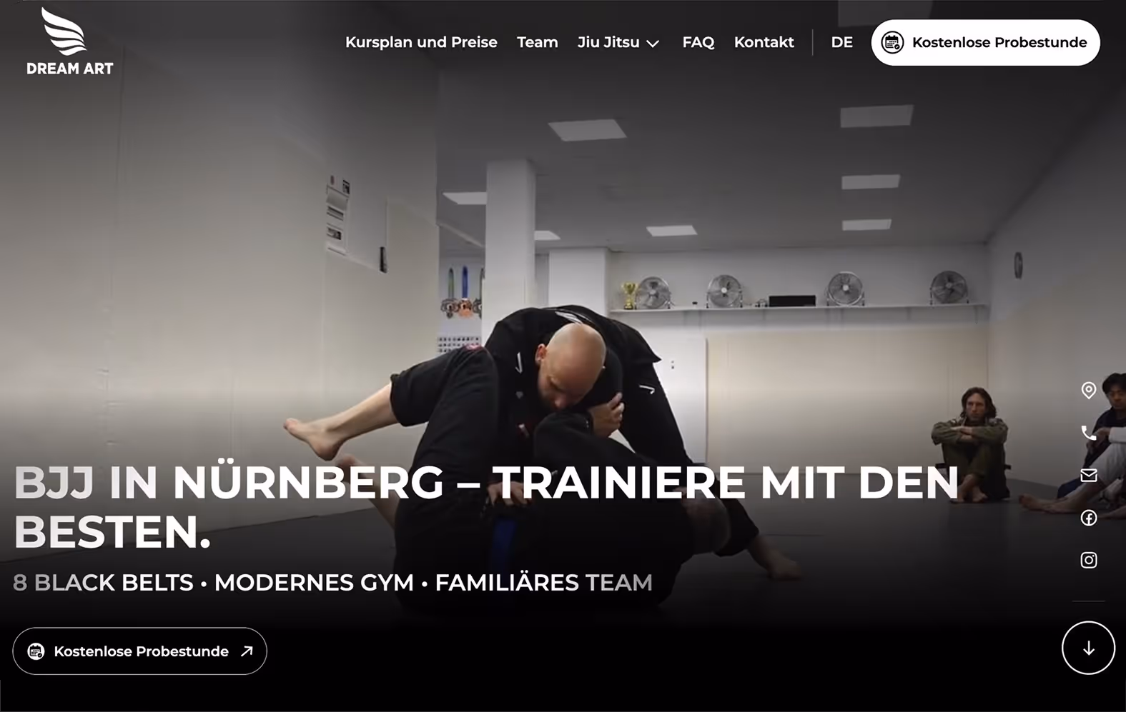 Brazilian Jiu-Jitsu class with an instructor demonstrating a hold on a student while others observe in a gym.