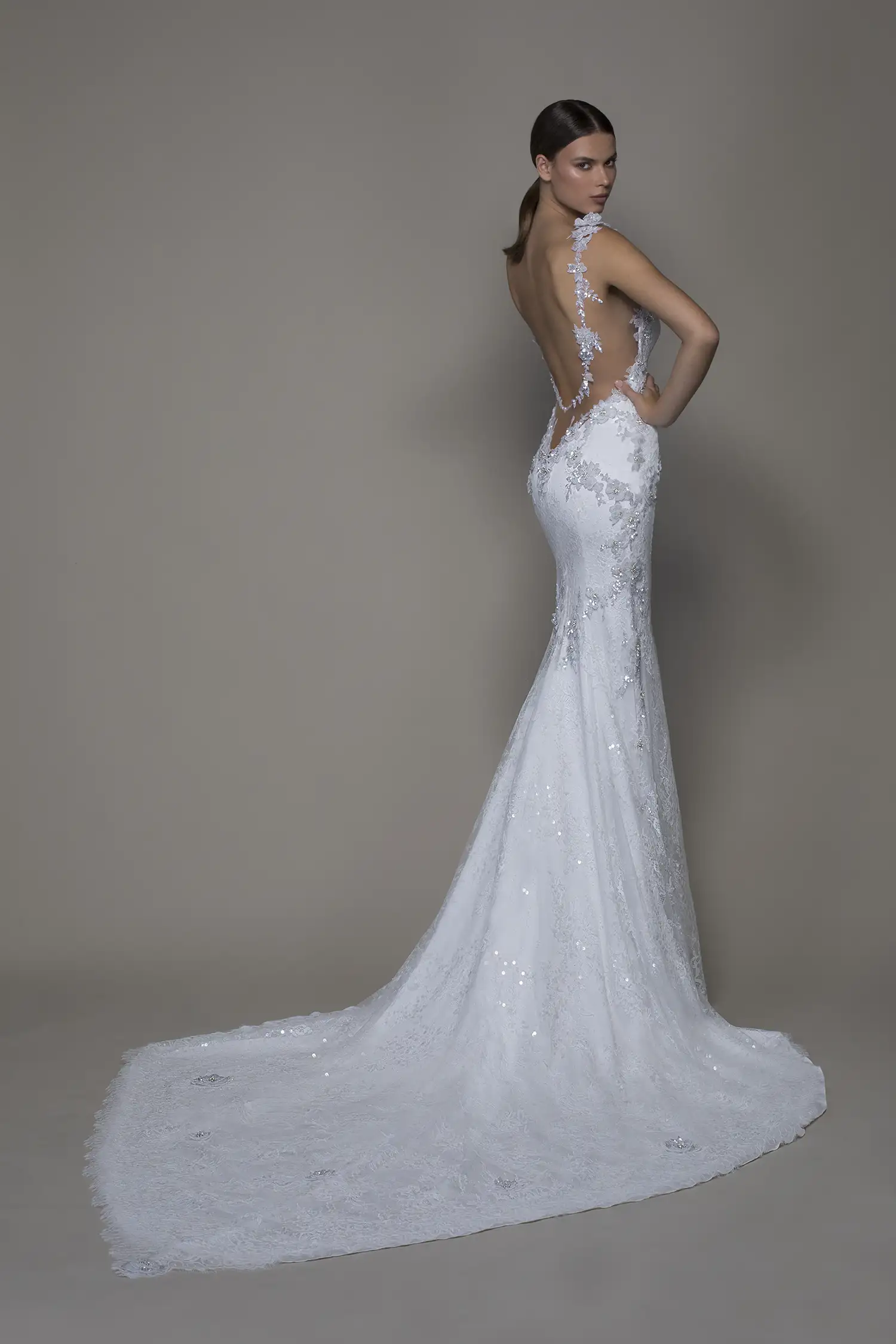 Lace sheath gown with dimensional silver sequin floral applique and detachable draped soft tulle cape