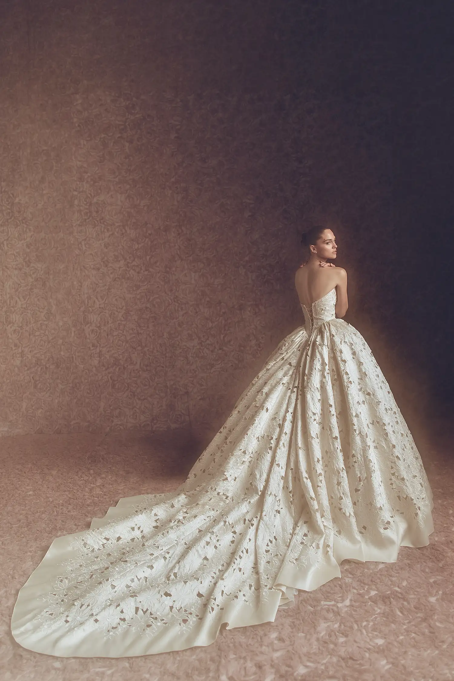 Strapless ballgown with gathered skirt and basque waist in embroidered cutout caramel mikado.