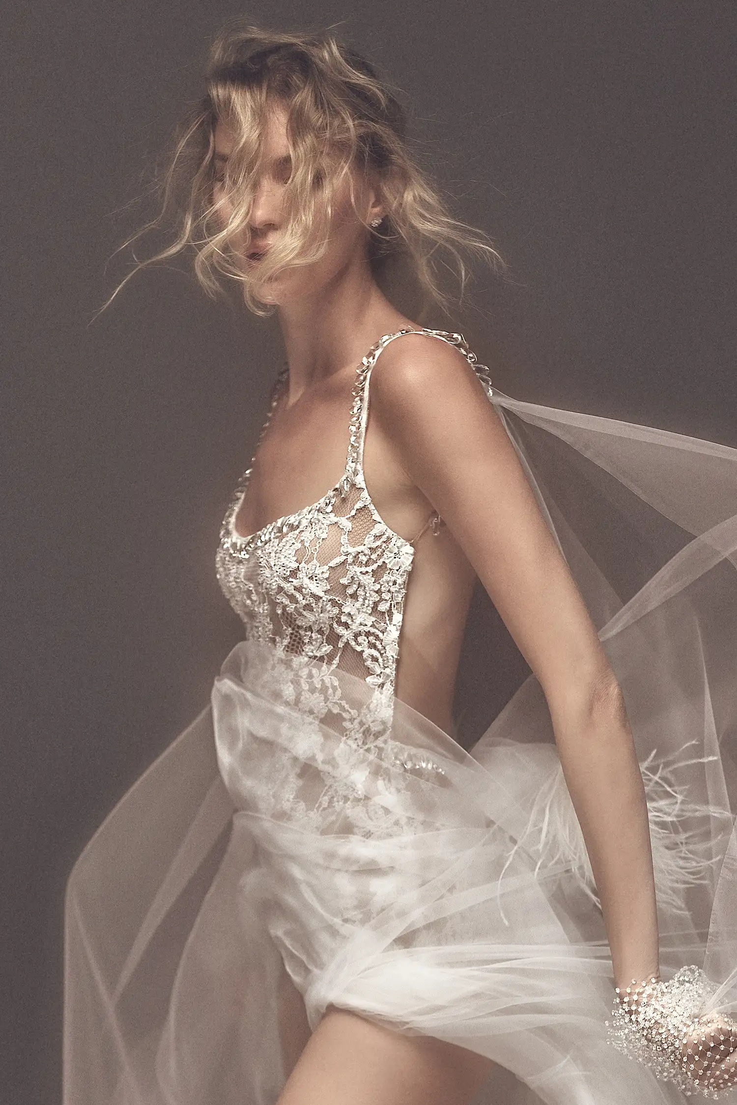 Square neckline bodysuit in chantilly lace fully hand beaded in water crystals with crystal droplet trim and open back, with featherlight organza A-line skirt.