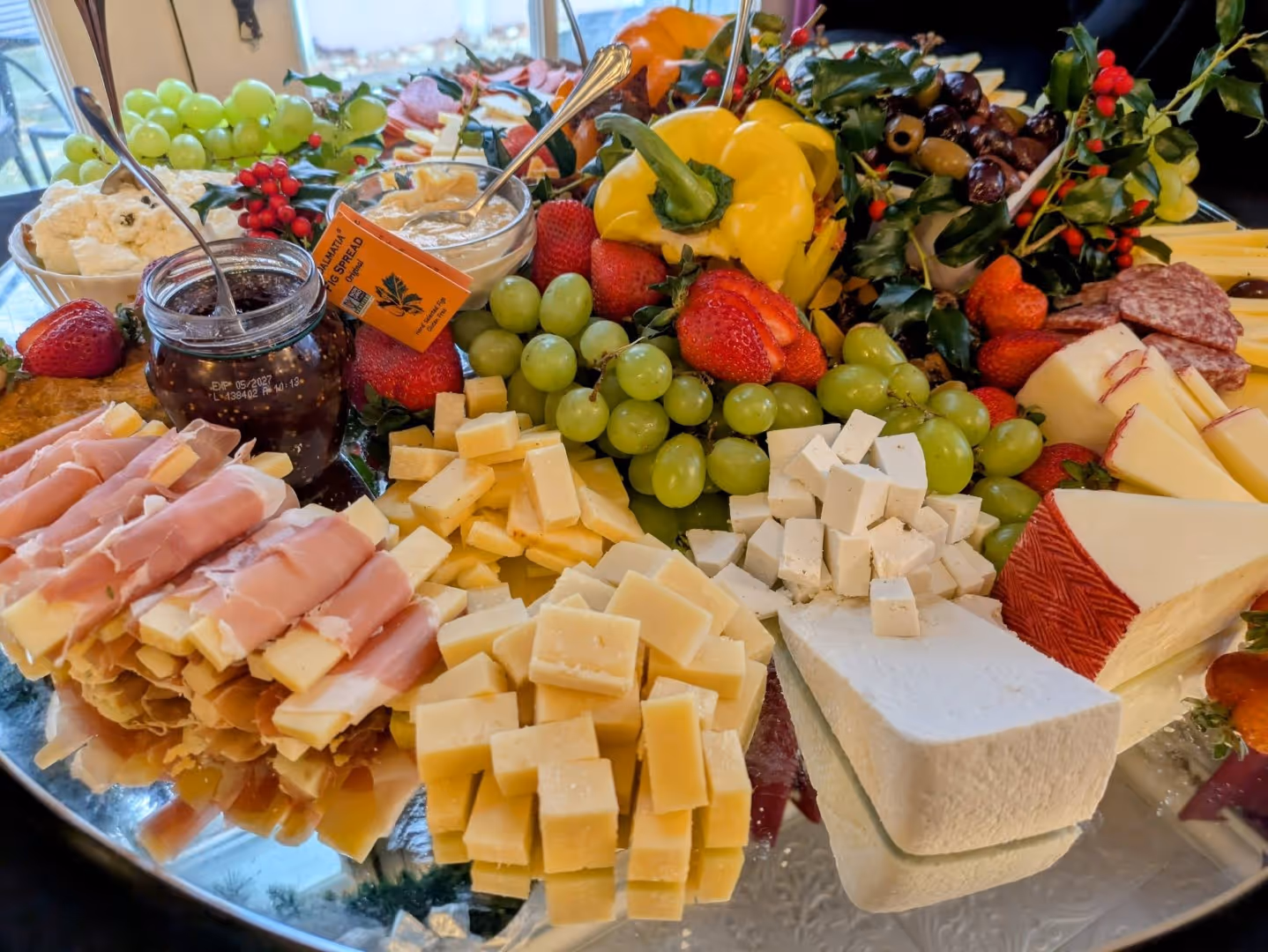 A close-up photo of a fruit, vegetable, and cheese platter prepared by the Rolling Ridge kitchen staff