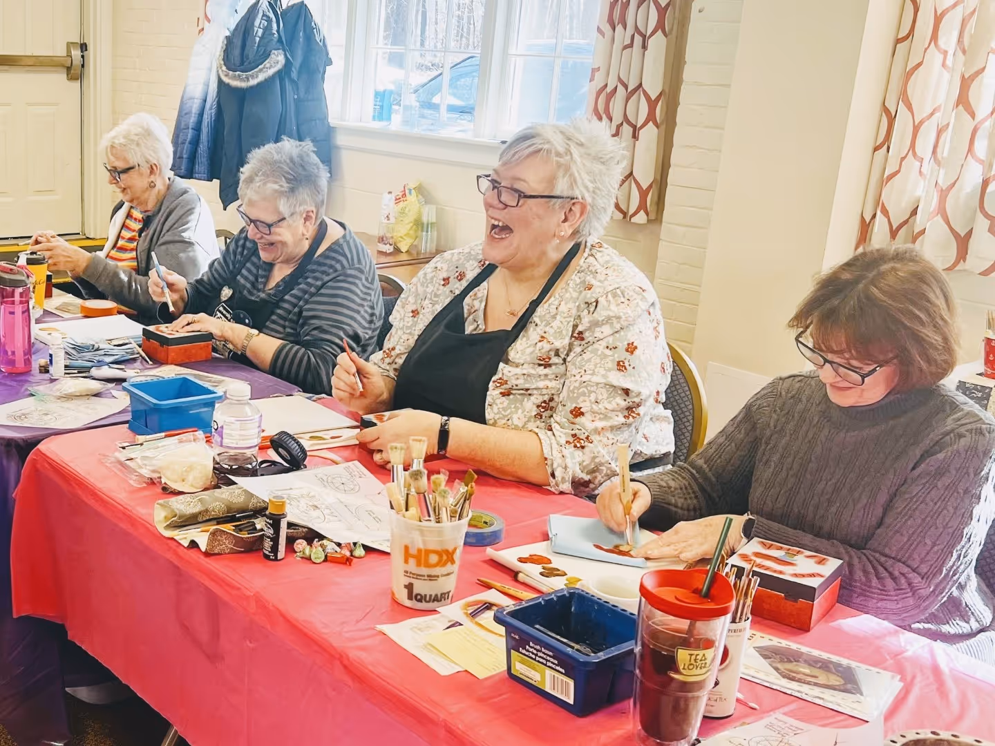 Participants at Rolling Ridge painting and coloring