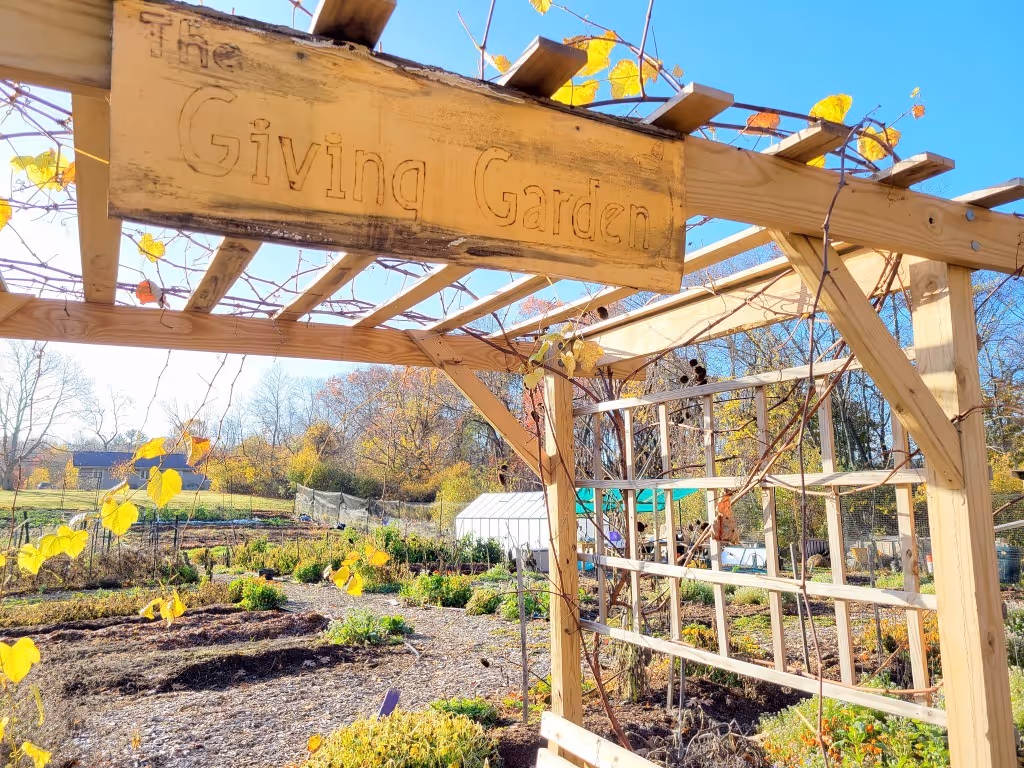 The trellis archway above the entrance to the Giving Garden at Rolling Ridge