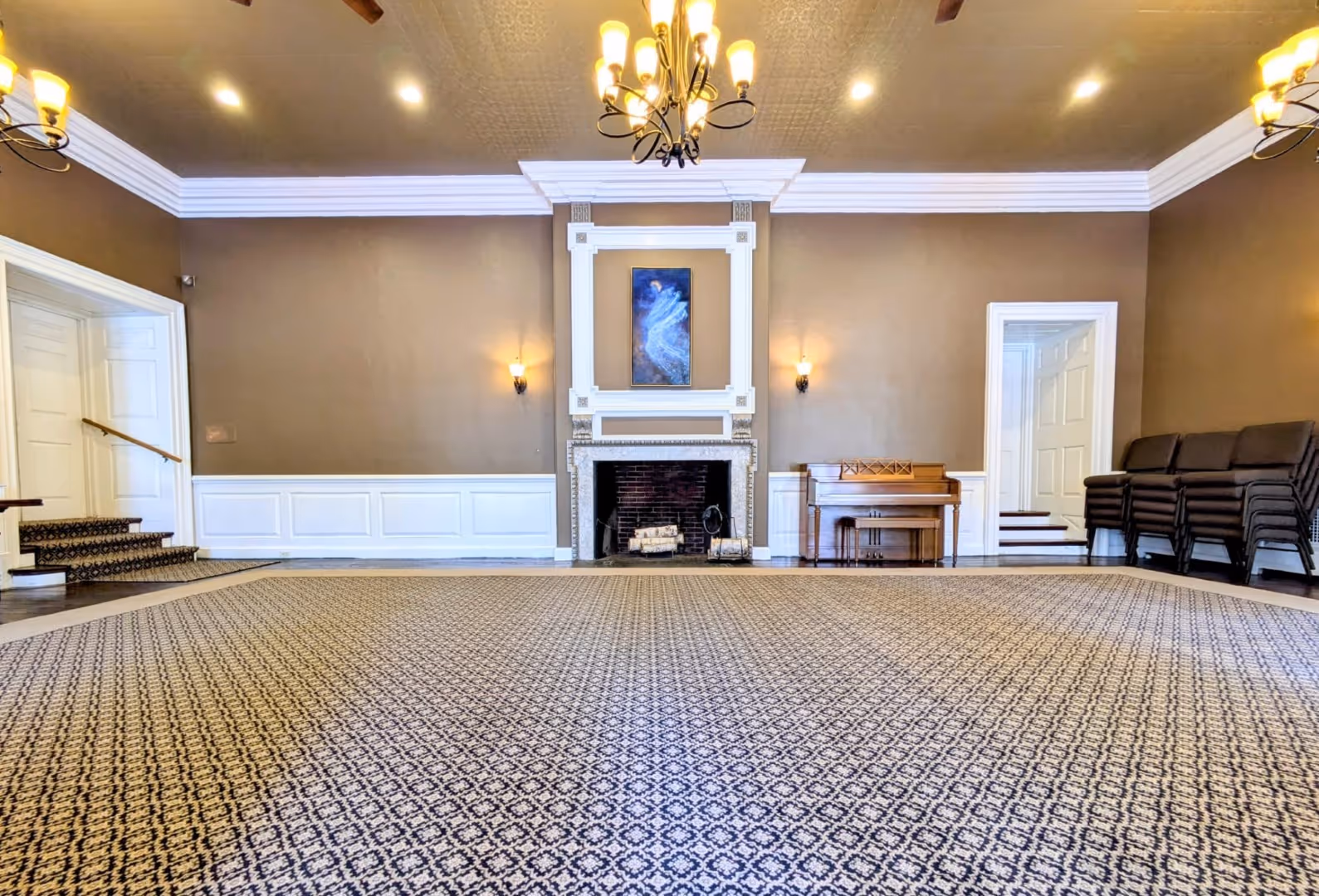 Rolling Ridge Tyson Hall from side wall with view of fireplace